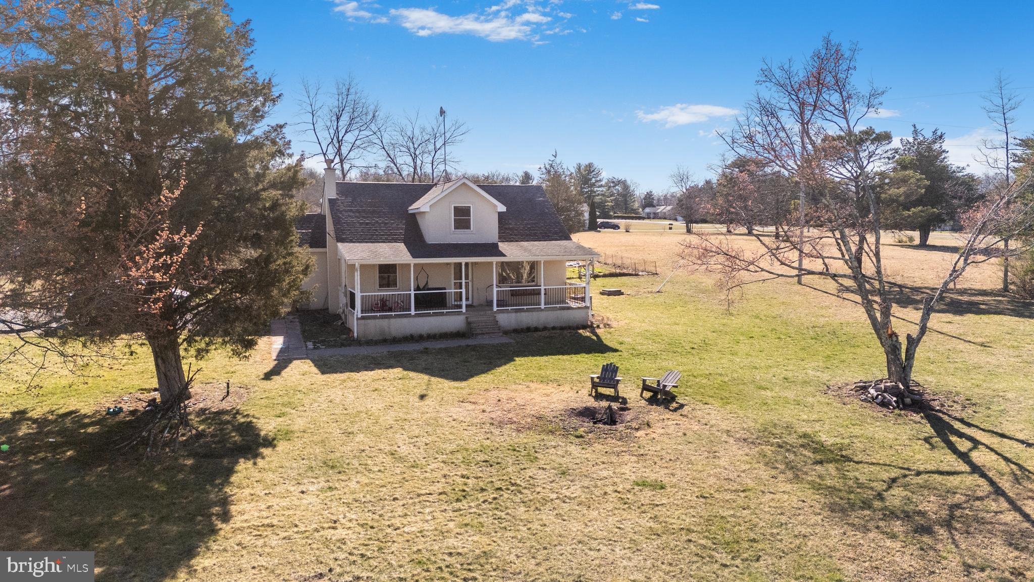 Charming Cape Cod on Nearly 6 Unrestricted Acres!

Enjoy the perfect blend of charm and privacy with this 4-bedroom, 2-bath Cape Cod situated on almost 6 unrestricted acres! Nestled in a peaceful setting, this home offers endless possibilities—bring your animals, build a workshop, or simply enjoy the open space. The inviting layout features a main-level bedroom, a cozy living area, and a spacious kitchen and separate dining room. Upstairs, you'll find additional bedrooms with plenty of storage. Outside, the expansive land provides room to explore, garden, or create your dream retreat. No HOA, no restrictions—just endless potential!  Electric car hook-up, multiple fruit trees and a firepit area.   Washer/Dryer hook-up in the basement (laundry area currently in basement) however washer/dryer hook-up is also on main level in kitchen closet which is currently used a a pantry.   Schedule your showing today!