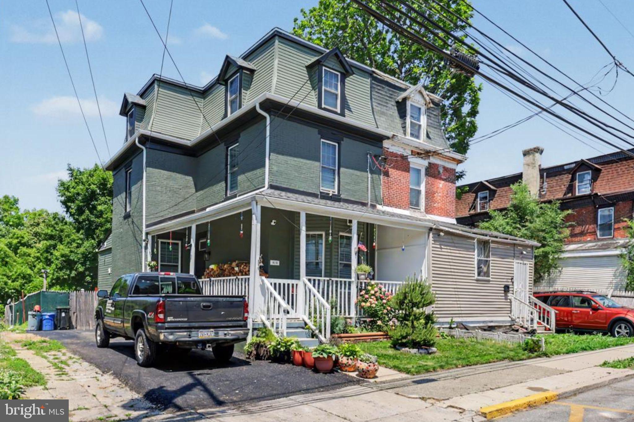 Introducing 410 S 7th St: A 4 bedroom, 1.5 bath twin home located on a quiet street in Darby Borough. Offering over 1,700 square feet of living space, this home combines classic charm and recent upgrades throughout. The main level features a beautiful front porch, a living room, formal dining room and a kitchen with stainless steel appliances. Just off the kitchen is a convenient first floor laundry room and powder room. Upstairs, the second floor offers two bedrooms and a full bathroom. The third floor provides two additional bedrooms, perfect for guests, home offices, or additional living space. Outside, enjoy the rear deck, fenced in backyard and storage shed. Major improvements completed within the last few years include new windows, siding, roofing, gutters, front and storm doors, hot water heater, and a brand new 200-amp electrical service. Conveniently located near shopping, public transportation, parks, schools, and major commuter routes with easy access to Philadelphia, this move in ready home is a great opportunity to own a well maintained property with space, updates, and value. This home is being sold As-Is