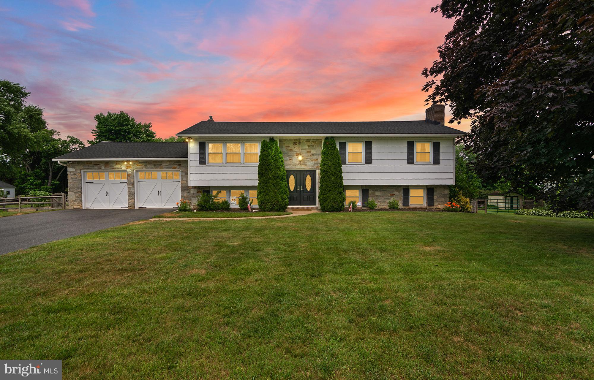 Beautiful Stone-Front Home on 0.81 Acres in the Heart of Fallston! Welcome to this spacious and beautifully updated split-foyer home, perfectly situated on a level lot in one of Fallston's most desirable locations. Offering four bedrooms and three full baths, this home combines generous living space, modern updates, and exceptional outdoor enjoyment. The upper level features a bright and inviting living room, open concept dining room into a fully renovated kitchen complete with custom cabinetry, quartz counters and brand-new (2026) stainless steel appliances. Step directly from the kitchen onto the rear deck, overlooking the expansive all-American backyard—perfect for entertaining, outdoor dining, or simply enjoying the peaceful setting. Three bedrooms complete with closet organizers and two full baths (renovated in 2021 & 2023) complete the main level, including a private primary suite. The fully finished lower level offers outstanding flexibility with a large family room featuring a cozy gas fireplace, a fourth bedroom that can also serve as a home office, an additional full bath, and convenient walkout access to the backyard. A separate laundry/mudroom provides direct access to the oversized two-car garage, making everyday living easy and efficient.  Nearly 2,300 square feet of finished living space.  Never run out of hot water with a Norwitz tankless water heater! Additional improvements include an updated roof (2016), all doors replaced (front doors in 2017) kitchen remodeled, lower level updated, and sliders (2022), new garage doors and openers as well as driveway repaved (2021) and numerous other updates throughout. The incredible, level lot is ideal for backyard bonfires and gatherings and offers endless possibilities for recreation, gardening, or future outdoor enhancements. A 12’x24’ Amish crafted shed complete with electric and a garage roll door is perfect for any crafter’s or gardener’s dream!  Ideally located near the Fallston Rec Complex, Fox Meadow Fields, shopping, dining, and commuter routes between Bel Air and Hunt Valley/Towson, this move-in ready home offers the perfect combination of space, updates, and location. Zoned for all Fallston schools. One year Cinch home warranty is included for the buyer!
