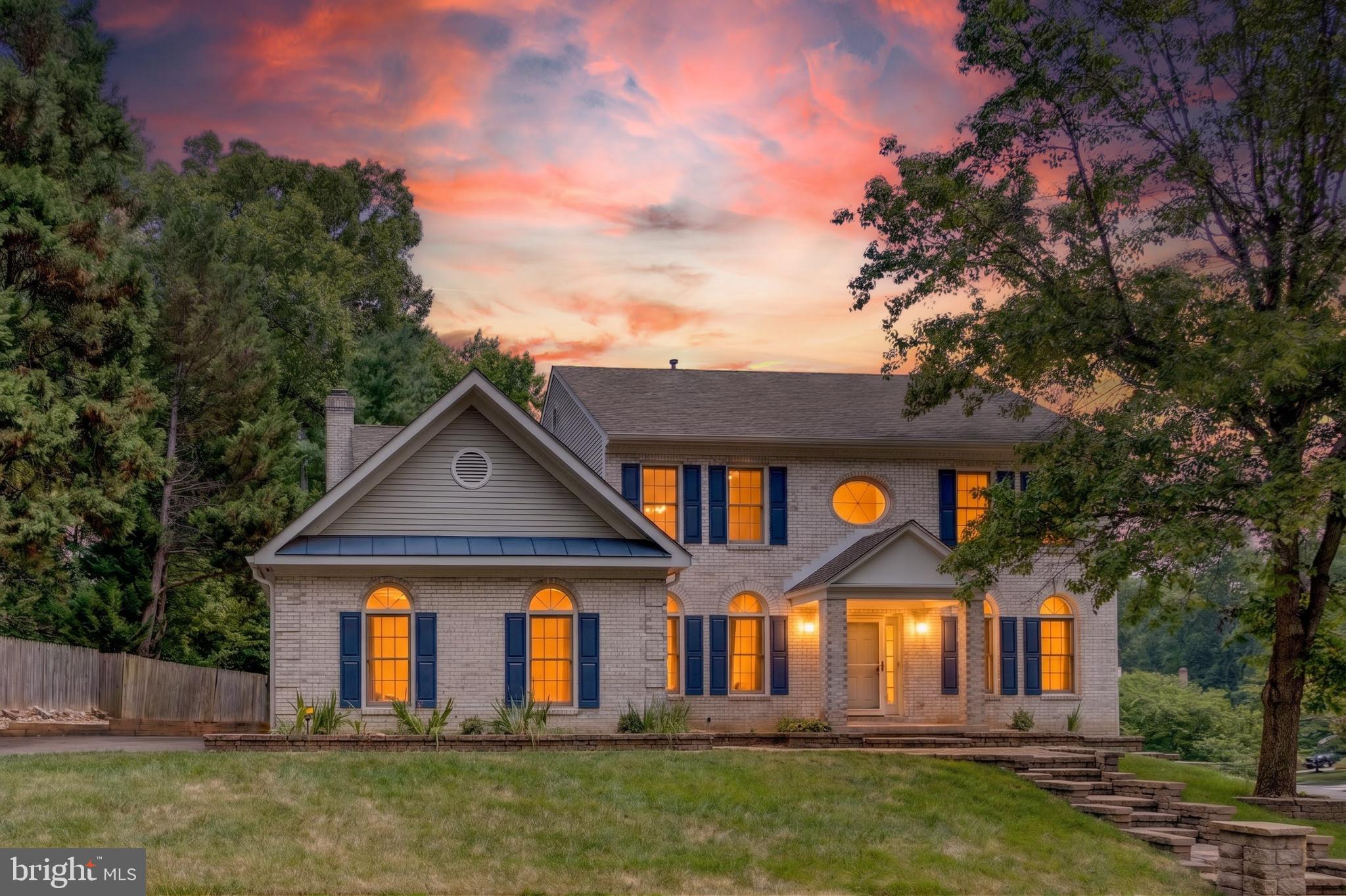 This gorgeous, beautifully remodeled, and meticulously maintained home, located in the highly sought-after Robinson High School pyramid, offers over 4,500 square feet of thoughtfully designed living space (plus an expansive four-season sunroom).

From the moment you arrive, you'll be impressed by the custom stone walkway and steps leading to the inviting front entrance. Inside, gleaming hardwood floors extend throughout all three finished levels, complemented by fresh paint and timeless, high-end finishes.

The heart of the home is the stunning gourmet kitchen, featuring gorgeous Matarazzo quartzite countertops, a large center island, pantry, spacious breakfast area and newer stainless steel appliances, including a new gas range and premium hood installed in 2022. The open layout is perfect for both everyday living and entertaining.

The main level also features  two cozy wood-burning fireplaces in two living rooms, and a versatile office or guest bedroom, perfect for today’s flexible living needs. Upstairs, you’ll find four additional spacious bedrooms, including three with private ensuite baths. The luxurious primary suite offers a beautifully renovated ensuite bath with matching quartz countertops, creating a cohesive, high-end feel throughout the home.

Seamlessly blending indoor and outdoor living is the spectacular four-season sunroom with hardwood floors, offering year-round enjoyment and abundant natural light. Sliding glass doors provide convenient access to the driveway and outdoor living spaces. Step outside to the low-maintenance Trex deck, added in 2022, which overlooks a private backyard and is an ideal setting for relaxing, entertaining, or enjoying peaceful evenings at home.

The finished lower level, which includes another bedroom, a full bath, and a private entrance, provides exceptional versatility with space for a home theater, in-law or guest suite, recreation room, workshop, utility room, and abundant storage and two cozy fireplaces. This home can offer Multi-generational living or  the lower level potentially  can be rental income. 

Nearby Amenities including: Lake Royal, Walking trail, Lake views, Fishing dock. And
Royal Lake Park, Playground,  Tennis courts, Walking paths,
 and George Mason University