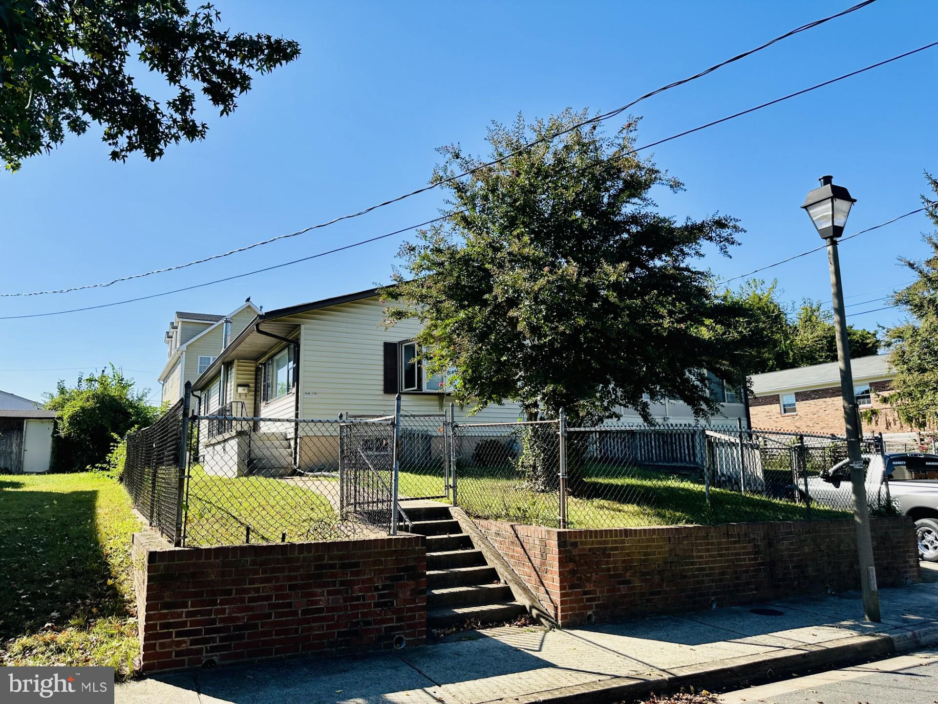 A rare opportunity in the heart of Arlington—1942 Lowell Street offers four lots totaling 9200 square feet in one of the area’s most sought-after and rapidly evolving neighborhoods. Surrounded by beautifully renovated homes and impressive new construction, the potential here is truly exceptional for redevelopment, investment, or creating a custom home from the ground up.

Just moments from the shops, dining, and entertainment of Shirlington Village, the location also provides easy access to parks, trails, and major commuter routes. You’re minutes to Pentagon City, Georgetown, National Airport, Amazon HQ2, and the Pentagon—making this a highly convenient and connected setting.

Zoned R2-7 (Residential Vacant Lots with single-family and townhouse potential), the property offers flexibility for a variety of residential uses (buyer to verify). Whether you’re a builder, investor, or end user looking for long-term value, this is a standout opportunity in a premier Arlington location.

Estate sale. Four lots are being sold together with 3 tax records 31-013-086, 31-013,087, 31-013,088. Also listed as land.  Buyers should perform their own due diligence regarding zoning, development potential, and intended use.  House sold in as-is condition to include all contents.