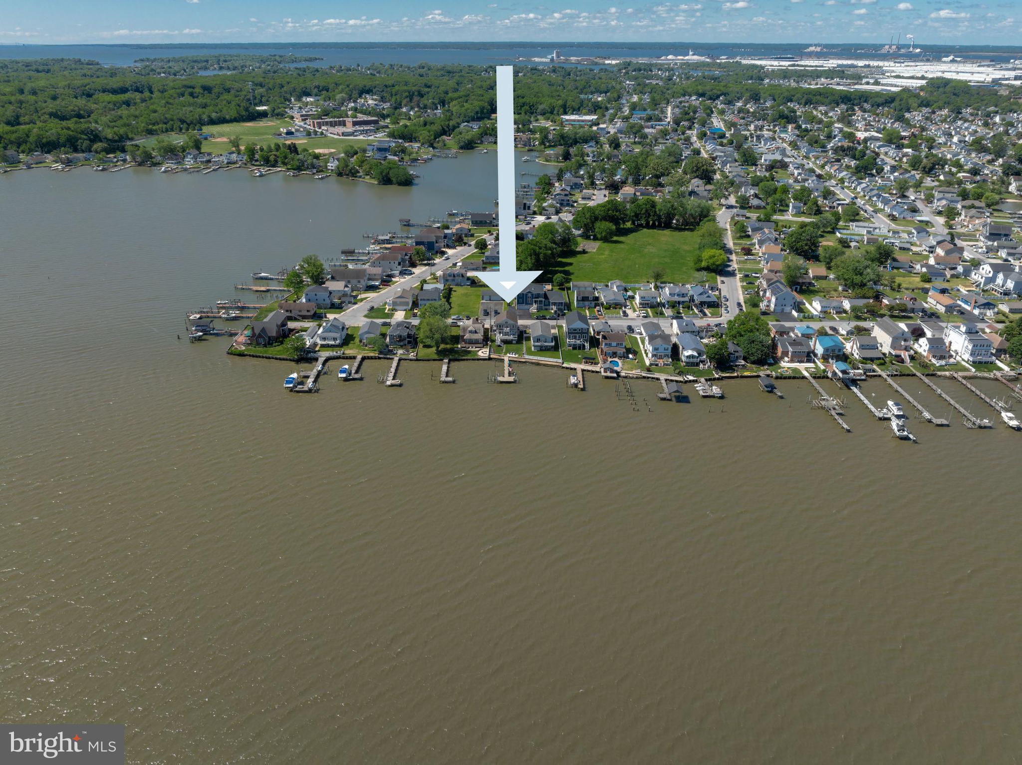 **OPEN HOUSE SATURDAY JUNE 27TH FROM 11AM-1PM**Welcome to 7112 River Drive Road, a meticulously maintained waterfront retreat offering nearly 4,000 square feet of total space and breathtaking panoramic views that take center stage from nearly every room. Combining luxury updates, exceptional boating amenities, and thoughtfully designed indoor and outdoor living spaces, this extraordinary home delivers the ultimate lifestyle.
From the moment you step inside, soaring ceilings, gleaming hardwood floors, and expansive windows draw your attention to the spectacular water views. Natural light fills the home, while the family room offers a cozy gas fireplace and built-in surround sound, creating an inviting setting for both everyday living and entertaining.
The beautifully updated kitchen features Quartz countertops, recessed lighting, abundant cabinetry, an undermount sink, center island with storage, and Samsung Smart appliances installed in 2021, including a tablet-style refrigerator with water dispenser and ice maker. A 2026 kitchen addition created a charming breakfast nook where you can enjoy your morning coffee while taking in the tranquil waterfront scenery. Andersen sliding glass doors with built-in blinds, installed in 2023, open to a maintenance-free walk-down composite deck, seamlessly blending indoor and outdoor living.
The main level also includes two bedrooms, a full bath with porcelain tub from the original home, a laundry room with Smart LG washer, second washer (SideKick), and Smart dryer.
Upstairs, double doors lead to the luxurious primary suite, where oversized windows continue to showcase stunning waterfront views. This spacious retreat offers vaulted ceilings, brand-new carpet, a sitting area, a custom walk-in closet, and a private composite deck overlooking the water. The newly remodeled spa-inspired en-suite bath features a walk-in shower, freestanding soaking tub, double vanity, Smart LED mirror, Bluetooth exhaust fan, and a Smart toilet with bidet, heated seat, and auto-flush functions.
A previously unfinished attic has been transformed into a fourth bedroom/bonus room with new carpet, recessed lighting, updated electrical, built-in storage, and closet.
Outside, boating enthusiasts will appreciate the impressive 80-foot T-pier with water, electric, 30-amp shore power, two boat lifts (12,500 lb. w/Gem remote and 3,500 lb.), and a 1,500 lb. jet ski lift. 3 ft MLW and a hard sandy bottom, this property is ideal for boating, fishing, and water recreation. On clear days, the sellers note you can see the Eastern Shore from the end of the pier.
Additional features include concrete bulkhead, under-deck drainage, two sheds with maintenance-free platforms, a Polywood swing overlooking the water, a two-car attached garage, tankless gas water heater, Nest thermostat, generator hookup, fresh interior paint (2023), sealed driveway (2024), new shutters, front door, chandeliers, Hunter ceiling fans, and updated exterior lighting. The pier was redecked in 2020 with new end caps and hurricane straps added in 2024.
Flood insurance is only $565 annually. 
This exceptional property offers easy access to waterfront dining, fishing, and endless boating adventures. Experience the unmatched beauty of waterfront living and schedule your private tour today.