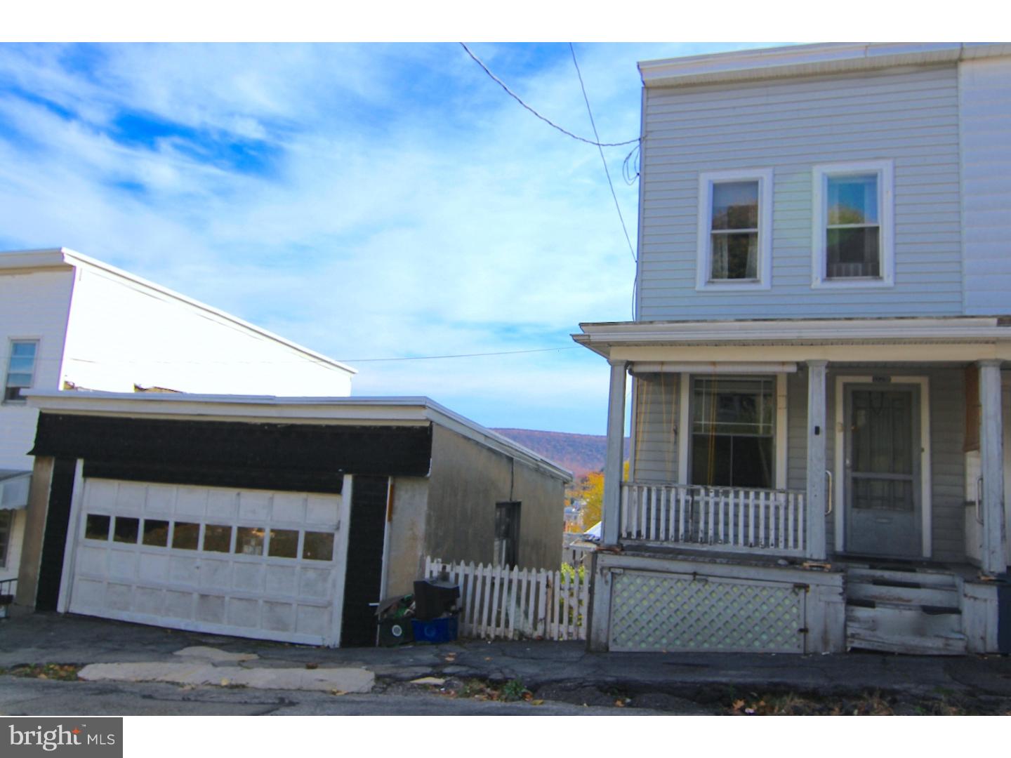 Nicely sized 3BR/1BA property with oversized lot and two-car detached garage with lower level storage. Needs some TLC but has loads of potential with great views of Pottsville, all vinyl sided, large fenced in yard, and full basement. First floor has combination living/dining room, rear kitchen and covered deck. Second floor has three separate bedrooms and full bath with walk-in shower. Great investor opportunity at this price.