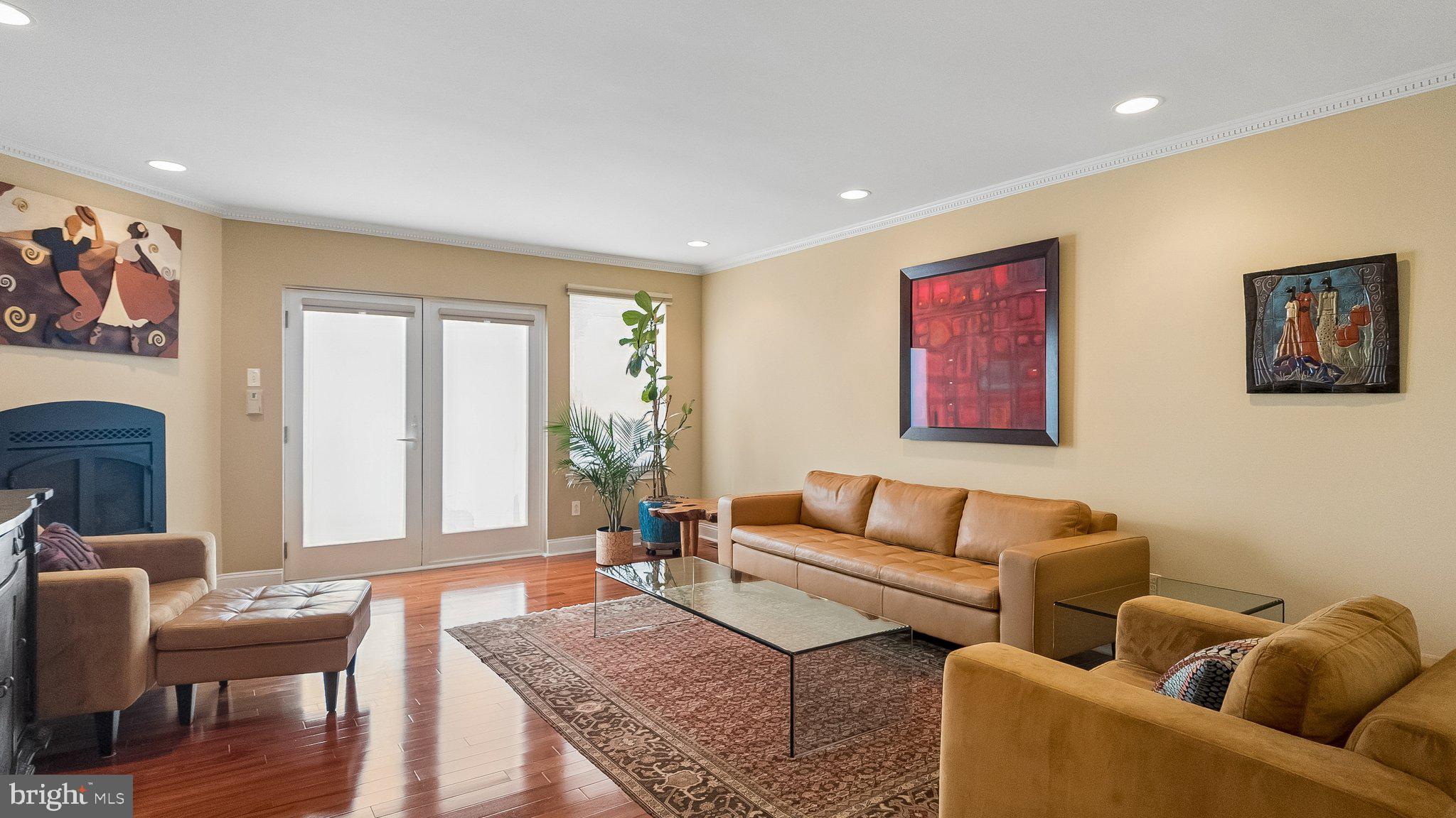 Welcome to 718 S 19th Street a contemporary townhouse in the highly desirable Graduate Hospital neighborhood of Philadelphia, where modern architecture and refined urban living come together.
Offering approximately 2,500 square feet, this sophisticated 3-bedroom, 3.5-bath residence is designed with clean lines, open spaces, and a focus on natural light. The main level features an open-concept living and dining area that flows seamlessly into a sleek, modern kitchen ideal for both everyday living and entertaining. A main-level bedroom or office/study adds exceptional flexibility, perfect for guests, remote work, or a private creative space. The upper-level bedrooms are generously scaled, including a well-appointed primary suite with a spa-inspired bath that delivers a calm, elevated retreat. A fully finished lower level expands the living space, offering versatility for a media lounge, home gym, or additional guest accommodations. Adding exceptional city convenience, the home includes attached garage parking plus an additional driveway space, providing rare 2-car parking in an urban setting. A private rear patio extends the living experience outdoors ideal for relaxed dining, entertaining, or quiet evenings at home. Set in the vibrant Graduate Hospital area, the property offers immediate access to acclaimed dining, neighborhood cafés, parks, and Center City, all within a dynamic yet residential environment. A rare opportunity to own a refined, contemporary residence in one of Philadelphia’s most sought-after neighborhoods.