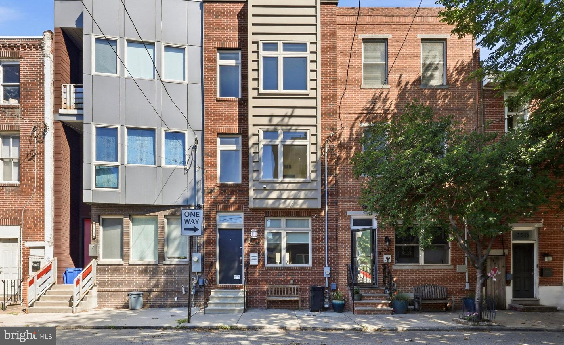 Welcome to 2544 Salmon Street, a spacious and light-filled 4-bedroom, 3-bath contemporary townhome in the heart of Fishtown. Built from the ground up in 2012, this home offers four levels of thoughtfully designed living space, modern finishes, and an ideal layout for everyday living and entertaining.

The main level features an open-concept floor plan with eco-friendly bamboo flooring, oversized windows, and abundant natural light. The gourmet kitchen is equipped with granite countertops, stainless steel appliances, a tile backsplash, ample cabinet space, and a large island that opens seamlessly to the living area. Just off the kitchen, sliding doors lead to a private fenced rear patio, perfect for outdoor dining, grilling, or relaxing.

The finished basement provides additional living space and a convenient powder room making it ideal for a family room, home office, or gym. 

The second and third floors offer four generously sized bedrooms with excellent closet space and two additional full bathrooms finished with European travertine tile and Kohler and Grohe fixtures. The spacious primary bedroom provides a peaceful retreat with oversized closets and plenty of room for a sitting area or workspace. A conveniently located second-floor laundry area adds to the home's functionality.

Situated on a quiet block in one of Philadelphia's most sought-after neighborhoods, you'll enjoy easy access to Fishtown's award-winning restaurants, coffee shops, boutiques, parks, and public transportation, making commuting to Center City quick and convenient.  **Plenty of public parking under I-95.** Schedule your showing today!