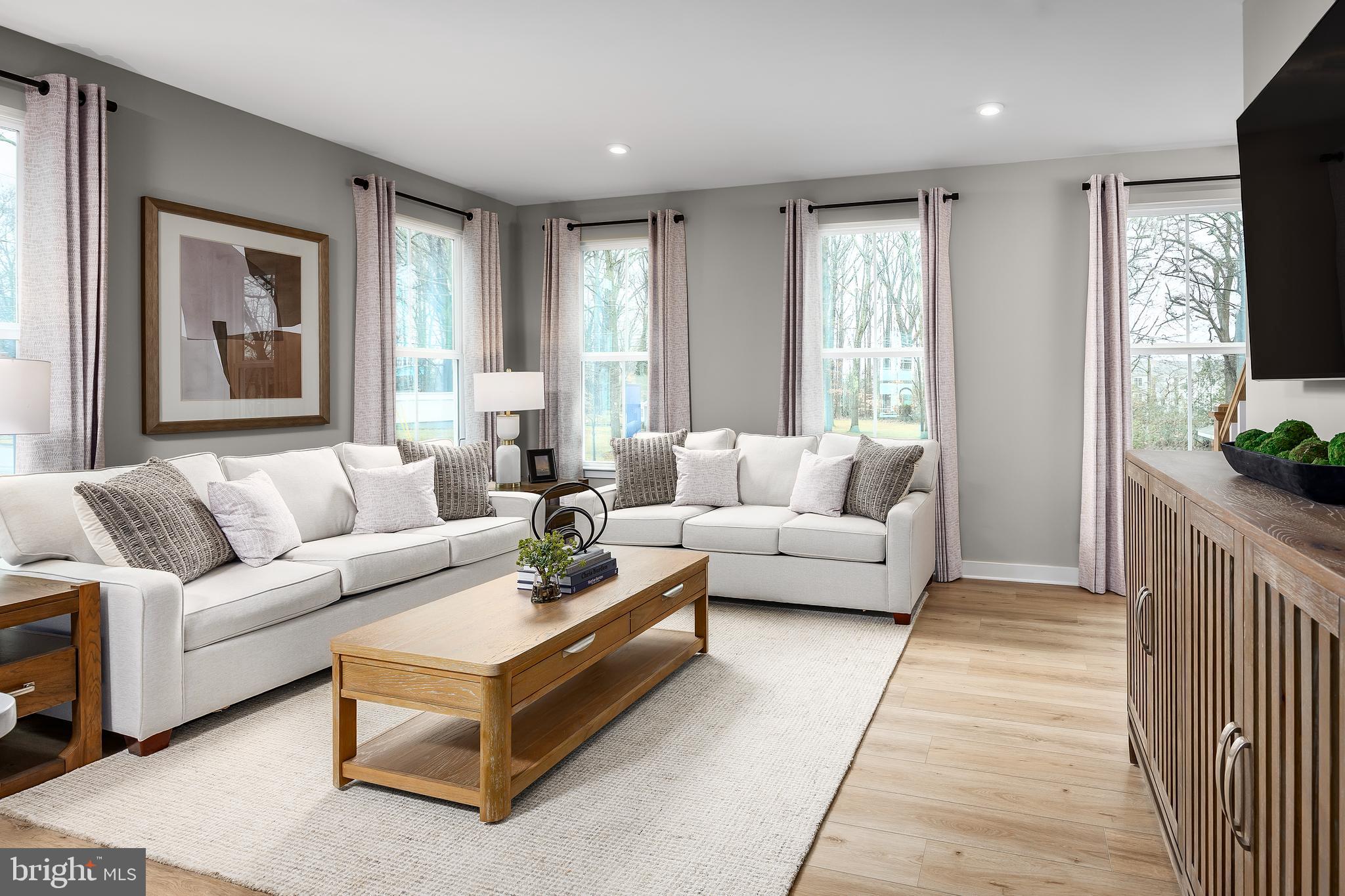 The to-be-built ARIA floorplan offers one of the best value new construction townhomes in Jefferson County with sizeable backyards, luxury included finishes and stone front exteriors. Madison Greens is a prime location walkable to Potomac Towne Center, right off Rt. 9 a short drive to Frederick, MD and Louden County, VA. The Aria boasts an included finished basement—perfect for a home office, gym,  second living area, or fourth bedroom. Upstairs, enjoy an open-concept main level featuring a spacious great room and a gourmet kitchen with a large island, ideal for entertaining or everyday living. The top level includes three bedrooms, including a private owner’s suite with walk-in closet and ensuite bath. With use of preferred lender receive our closing cost assistance incentive! Low maintenance living is available at Madison Greens- lawn maintenance, community amenities,  AND trash and recycling included in monthly HOA. Come visit our model home at: 1741 Destrier St, Ranson, WV, 25438