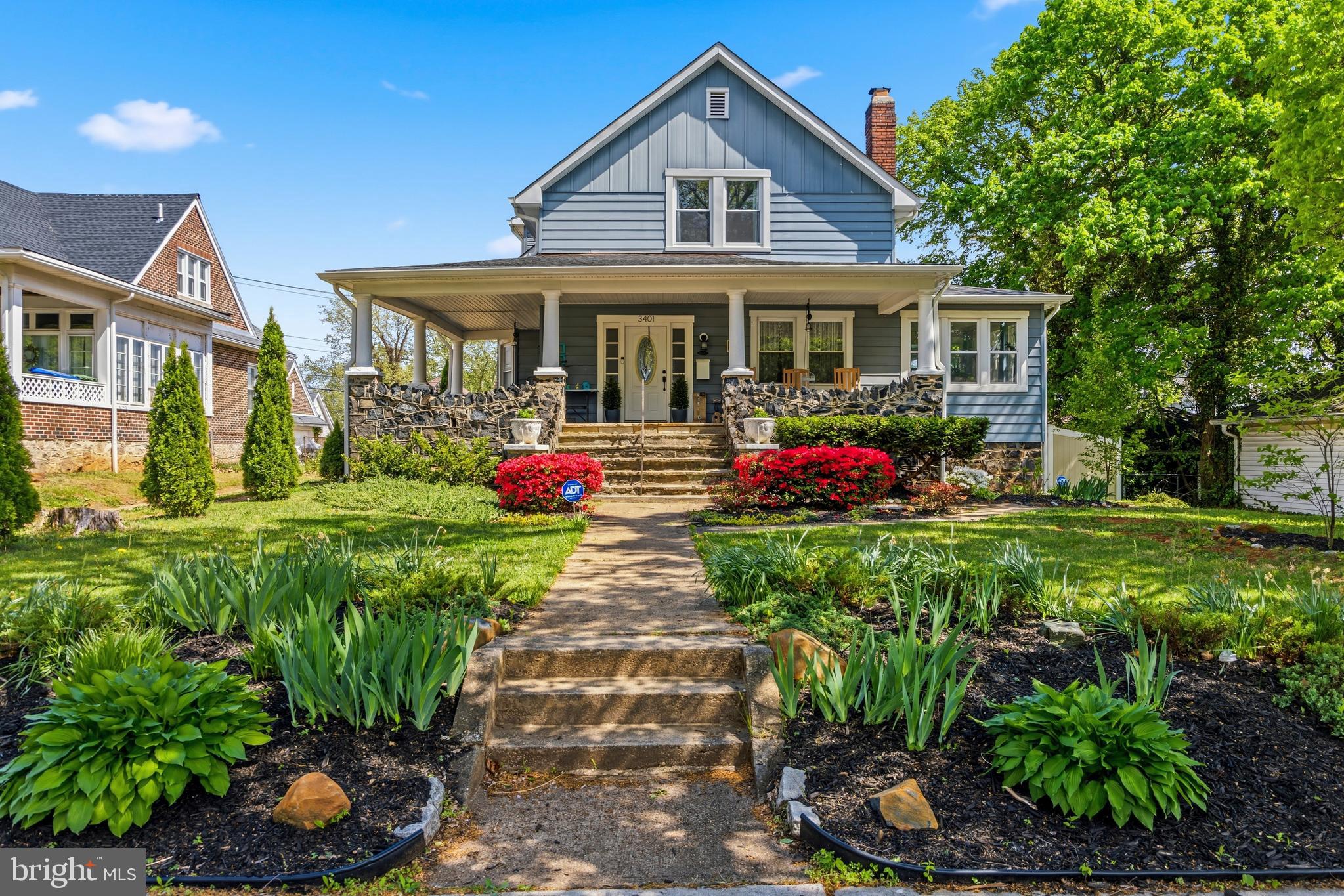 This charming and worry free, down to the studs renovation features beautiful landscaping, a welcoming wraparound front porch, and a thoughtfully designed, highly livable layout. The main level offers hardwood flooring throughout, a cozy living room with fireplace, and abundant natural light. Just beyond, a sun-filled sunroom and adjoining family room provide the perfect space to relax or entertain. The dining room includes additional closet space ideal for linens or a potential pantry and flows seamlessly into the kitchen. The kitchen is equipped with granite countertops, stainless steel appliances, a breakfast bar, and space for a casual dining table. Bay windows bring in plenty of natural light, while a flexible storage area and direct access to the backyard add everyday convenience. Upstairs, the primary suite features plush carpeting, an en-suite bath with a linen closet, and the added benefit of upper-level laundry. Three additional bedrooms and a full hall bathroom complete the upper level. The finished lower level, featuring LVP flooring, offers a versatile flex space along with two additional rooms perfect for a home office, gym, or guest use. Enjoy outdoor living in the fully fenced backyard, along with a detached two-car garage providing added functionality and storage! Ideally located in Baltimore, this home offers convenient access to a variety of nearby amenities including shopping, dining, and everyday conveniences. Enjoy close proximity to local parks, schools, and major commuter routes, making travel to downtown Baltimore and surrounding areas seamless. Nearby destinations such as shopping centers, grocery stores, and neighborhood restaurants add to the ease and appeal of this beautiful property!