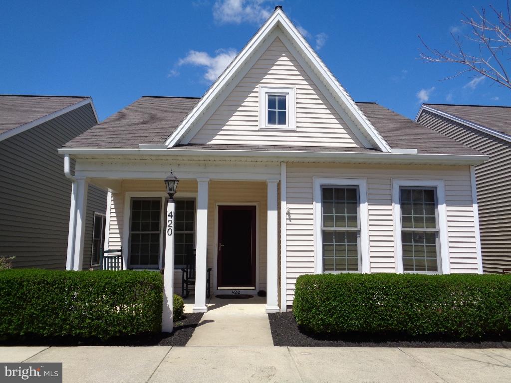 Ready to move into. Well maintained property. Upgraded appliances & window treatments included. Third BR is used as den/office. Open floor plan with LR gas fireplace. Cute fenced patio off dining area & nice front porch. Very appealing 55+community with walking trails & short distance to shops, dining & parks.
