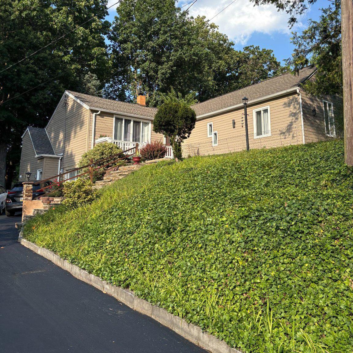 Welcome to 3113 Green Valley Road - a beautifully expanded and renovated 4-bedroom, 3-bath home set on a private .48-acre lot in desirable Newtown Square within the Marple Newtown School District.

The main level showcases a stunning renovated kitchen featuring a large center island with dramatic black granite countertops, custom cabinetry, designer tile backsplash, professional-style range hood, stainless steel appliances, and pendant lighting - all flowing seamlessly into the dining and living areas with hardwood floors, a stone fireplace feature wall, and abundant natural light. A recent addition expanded the main level footprint to include three bedrooms and two full bathrooms, including a freestanding soaking tub, oversized marble walk-in shower, and spa-quality finishes.

The fully finished walkout lower level adds approximately 900 sq ft of flexible living space - complete with a fourth bedroom, full bathroom, living area, laundry, and the comfort of heated flooring - with direct outdoor access that makes it feel far more like bonus living space than a traditional basement. Ideal for guests, extended family, a home office, or recreation.

Outside, the property truly delivers. A front deck and separate rear deck provide multiple outdoor living spaces, while a pergola-covered outdoor kitchen and grilling area overlook a generous yard framed by mature trees - an entertainer's dream with a genuinely private feel. The long driveway and lush landscaping add to the peaceful setting.

Tucked into a quiet no-outlet neighborhood just off West Chester Pike with easy access to Media, Wayne, the Main Line, top dining, shopping, and major commuter routes. A rare opportunity to own a turnkey, move-in ready home with high-end finishes and exceptional outdoor living in the heart of Newtown Square.