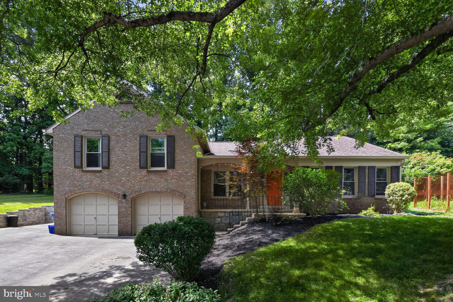 Nestled on a quiet cul-de-sac and surrounded by parkland adjacent to Wheaton Regional Park, this beautifully updated 4-bedroom, 3-bath split-level offers the perfect balance of space, warmth, and modern convenience. With approximately 2,800 finished square feet, the home features an open front-to-back floor plan enhanced by soaring cathedral ceilings and abundant natural light throughout.

The renovated kitchen serves as the centerpiece of the home, thoughtfully updated with modern finishes, stainless steel appliances, and seamless flow into the main living spaces—ideal for both everyday living and entertaining. Hardwood flooring extends through the living room, piano room, and kitchen, adding timeless character and warmth. The spacious primary suite includes a beautifully renovated en-suite bath designed with comfort and style in mind.

Step outside to a private rear deck overlooking peaceful natural surroundings, complete with a hot tub that creates the perfect setting to unwind year-round. Additional highlights include a spacious 2-car garage, generous living areas across all three levels, meticulous upkeep throughout, and Ride-On access conveniently located at the neighborhood entrance.

Combining tranquility, updated living, and exceptional access to parks, commuting routes, shopping, and recreation, this is a rare opportunity in an established Silver Spring setting.