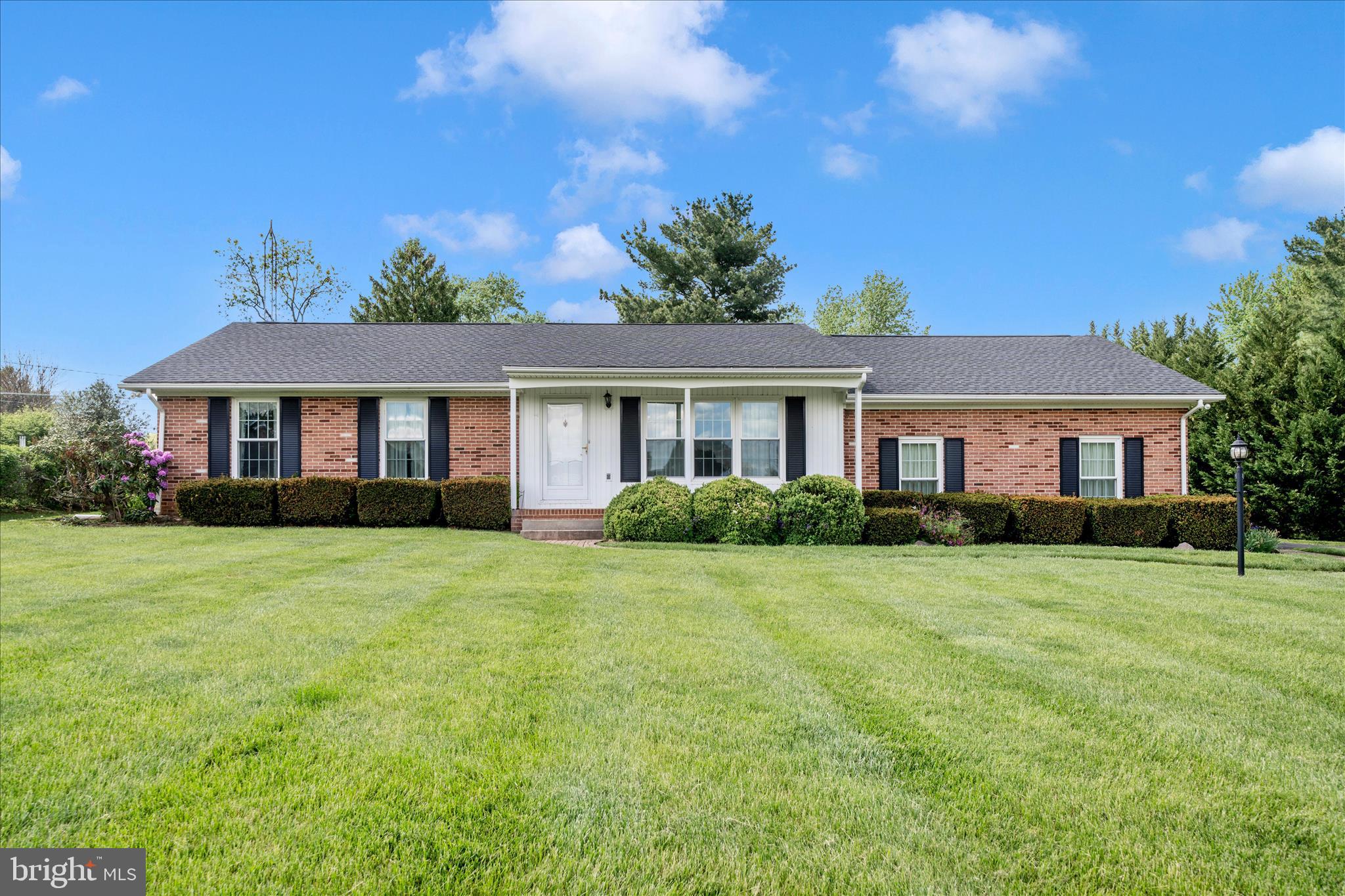 Back on Market To no Fault of Seller - Buyers Home  Did Not Settle   
Opportunity is Knocking !!  Charming all-brick rancher on a premium .97-acre corner lot offering the perfect blend of privacy, space, and convenience. This well-maintained home features 3 bedrooms and 2.5 baths, spacious living room along with an inviting eat-in kitchen highlighted by a cozy wood-burning fireplace—ideal for everyday living and gathering.
The finished lower level is designed for entertaining, complete with a wood stove and built-in bar, creating the perfect space for hosting or relaxing. Step outside to a patio and an enclosed rear porch, perfect for outdoor dining, entertaining, or simply enjoying peaceful views of the professionally landscaped yard with lush, rolling green grass. A storage shed adds extra functionality.
Major updates have already been taken care of, including HVAC (2023), hot water heater (2024), newer roof, and a recently repaved driveway, plus the added peace of mind of a whole-house propane generator. While the home offers solid bones and key improvements, it presents an excellent opportunity for buyers to add their own modern touches and build equity.
Ideally located just minutes from Rt. 15, this home offers easy commuting access and is close to all the charm and amenities of Frederick—including local breweries, restaurants, boutique shopping, and outdoor recreation at Baker Park, known for its community events, live music, and movies in the park.
A rare opportunity to own a spacious property in a prime location with endless potential.