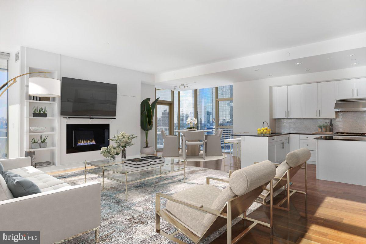 Open House - BY APPOINTMENT ONLY on Sunday 2/18 from 1pm-3pm. Welcome to One Riverside Condominium. A world-class building situated on one of Philadelphia's most spectacular waterfront locations. This corner unit is a 3 bedroom, 3.5 bath condominium with fireplace and is a stunning sight to behold and includes 1 parking license. As you enter, you are immediately star-struck by the breathtaking views of Philadelphia through the floor-to-ceiling windows that line every wall of the unit with custom electric shades. Located in one of the most desirable locations in Philadelphia, One Riverside is situated among Schuylkill River Park and Fitler Square Park, offering beautiful gardens, the delightful community dog park, tennis courts and access to the river trail. The terrace, off of the living room, allow you to step out and enjoy the dramatic and endless views of the city skyline. The eat-in kitchen is equipped with Miele appliances, granite countertops and plenty of storage. Each bedroom has an en-suite and spacious closets.  The wealth of amenities makes One Riverside that much more desirable with its state-of-the-art fitness center, indoor pool, fully equipped business center, club room with fireplace and catering kitchen, lush private garden, hospitality suite for guests at $200 per night, commercial-grade laundry for oversize items, (additional cost) valet garage parking, 24-hour concierge service, cold storage for grocery delivery, and a terrace with an outdoor kitchen and stunning city views. Gas is also included. Just a 10-minute walk to 30th Street Train Station, the University of Pennsylvania, Drexel University, Rittenhouse Square, Boathouse Row, and more! Unit interior photos to follow!