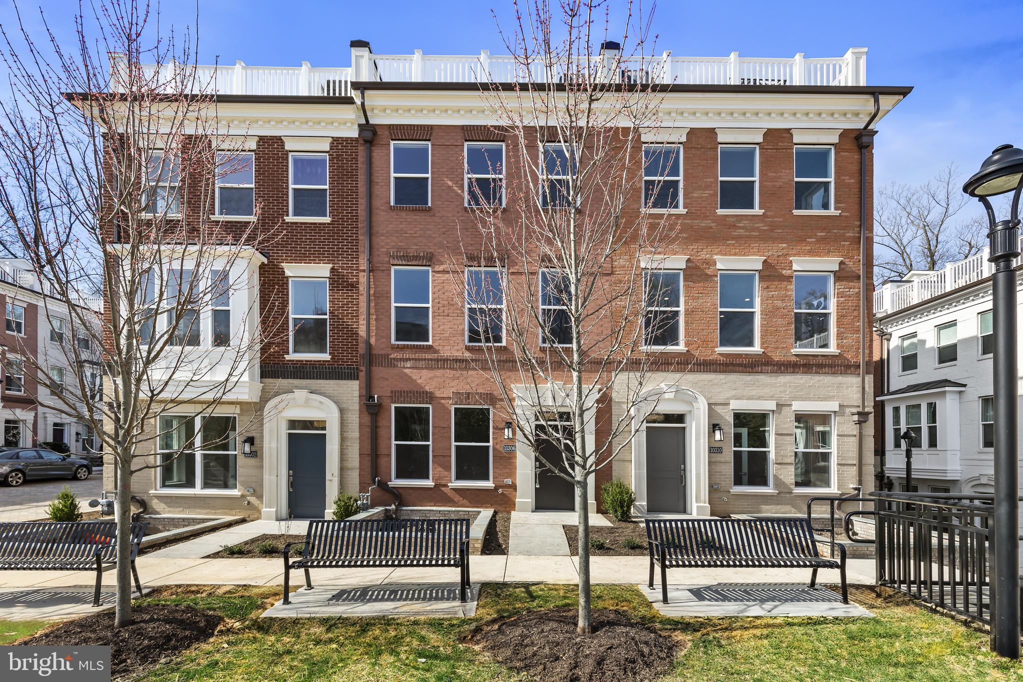 Step into elegance and sophistication in this stunning  4-level townhome, where an immediate sense of spaciousness greets you. 

As you traverse the exquisite wide-plank flooring, you'll be captivated by the soaring 9-foot ceilings that grace each of the four levels. The main level boasts a chef-inspired kitchen that will delight culinary enthusiasts, featuring luxurious 42" cabinets with soft-close drawers and doors, under-cabinet lighting, and microbe-resistant quartz countertops. The eye-catching ceramic tile backsplash and sleek stainless steel appliances elevate the space, while the expansive island with an eat-in bar invites casual dining and gatherings. Natural light floods the open-concept living area through floor-to-ceiling windows, which seamlessly connect to your private rear deck—perfect for entertaining or enjoying quiet moments outdoors. 

Each bedroom is a private sanctuary, complete with an en-suite bath adorned with elegant 12 x 24 Carrara Porcelain floor tiles, quartz countertops, and generous closet space. The loft level is a true highlight, featuring a private bedroom and full bath, complemented by an open loft complete with a wet bar that effortlessly extends to the outdoor terrace—creating an ideal setting for relaxation and entertaining while soaking up the fresh air and sunshine.

This home is equipped with energy-efficient and smart home features, including a tankless water heater, dual-zone heating and cooling system, Honeywell Smart thermostat, and a state-of-the-art security system—offering both comfort and peace of mind.

Ideally located, you’re just minutes from the Grosvenor-Strathmore Metro Center, Strathmore Music Center, and scenic trails like the Rock Creek and Bethesda Trolley Trails. Enjoy the vibrant atmosphere of Bethesda Row, Pike & Rose, and easy access to major highways I-495 and I-270.

Please note: Photos are of the model home, not actual home being sold.