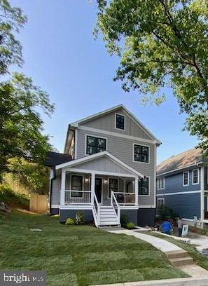 This major renovation and expansion started in 2022 is almost complete in the sought after area that is in close proximity to downtown Silver Spring with an easy walk to the downtown area shopping, restaurants and METRO.  Convenience meets elegance! This custom 5 bedroom, 4.5 bath home with over 4,100 finished square feet (ignore tax record) "checks all the boxes" for today's desired features and designs. The floor plan is designed for modern living with an open main and basement level floor plans and large living spaces.  The main and top floor offers 3/4" Vintage Scraped solid hardwood flooring. The gourmet kitchen will excite the most avid cook or entertainer with lots of quartz counter space including a large Island with waterfall quartz, upgraded cabinetry, Bosch stainless appliances, including a 36" industrial stove and hood, and beautiful ceramic tile backsplash. The kitchen flows perfectly to the large living family room space with a gas fireplace and designer accent tile and the large dining room space that leads to a large covered deck area in the back overlooking a very large fully fenced backyard space for more entertaining or relaxing space. The den/office on the main floor is the perfect private area for the home office and the custom made nook for everyday backpacks/shoes etc. is the perfect touch of utility and style. This home boasts designer light fixtures and recessed lighting throughout.  The master bedroom  offers a luxurious space and style  with an ensuite owner's bath with soaking tub and marble tile shower for pampering yourself and large "His and Her" closets.  The other bedrooms offer more large living spaces with a second master option with its own bath and two other bedrooms that share a hall bath plus a loft area nook perfect for study/play area on this same floor.  The basement is perfectly designed with a large finished recreation/multipurpose room with a wet bar and a large 5th bedroom with walk out access and a large storage/utility room option.  New HVAC systems, water heater, roof, windows, appliances are all move in ready for your enjoyment and peace of mind. The front of the house does not give you a good indication of the actual space and there are so many more things to talk about this house but seeing it will fill in the gaps.  You will certainly fall in love with this home at first sight.