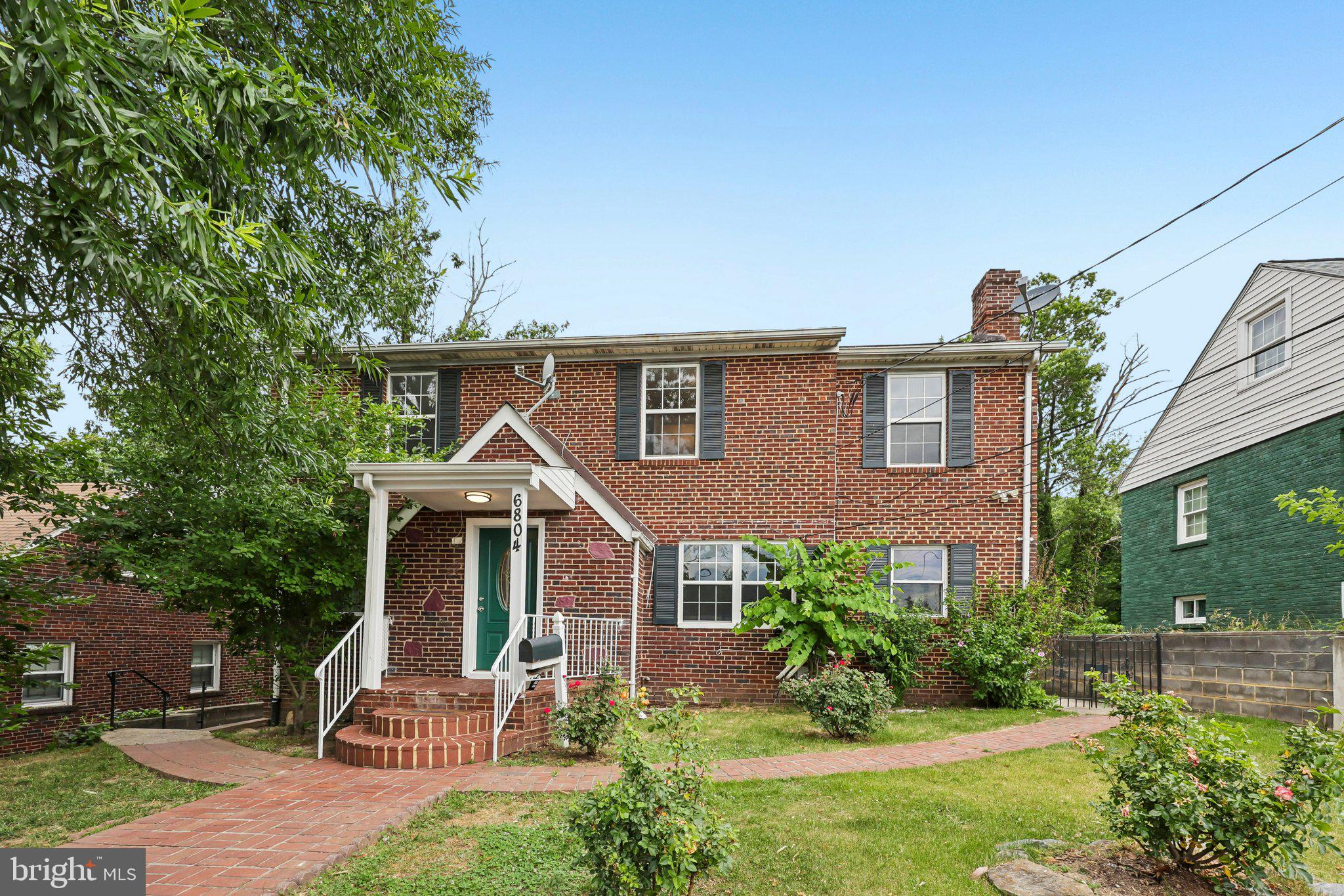Rarely available 6-bedroom, 3-full-bath brick home offering exceptional flexibility across three finished levels in the heart of Takoma Park.
The main level features two bedrooms and a full bath, while the upper level offers four additional bedrooms and a full bath, providing space for multigenerational living, guests, work-from-home needs, or growing households. The walk-out lower level includes additional finished living space, a kitchenette, two bonus rooms, and a full bath, creating endless possibilities for recreation, hobbies, fitness, guest accommodations, or flexible living arrangements.
Freshly painted and move-in ready, this home combines classic charm with a highly functional floor plan rarely found in the area. Updated windows (2021), a deep lot, mature landscaping, and a convenient location close to parks, shopping, dining, schools, and major commuter routes complete the package.

A unique opportunity to own a versatile home with exceptional space and flexibility in sought-after Takoma Park.