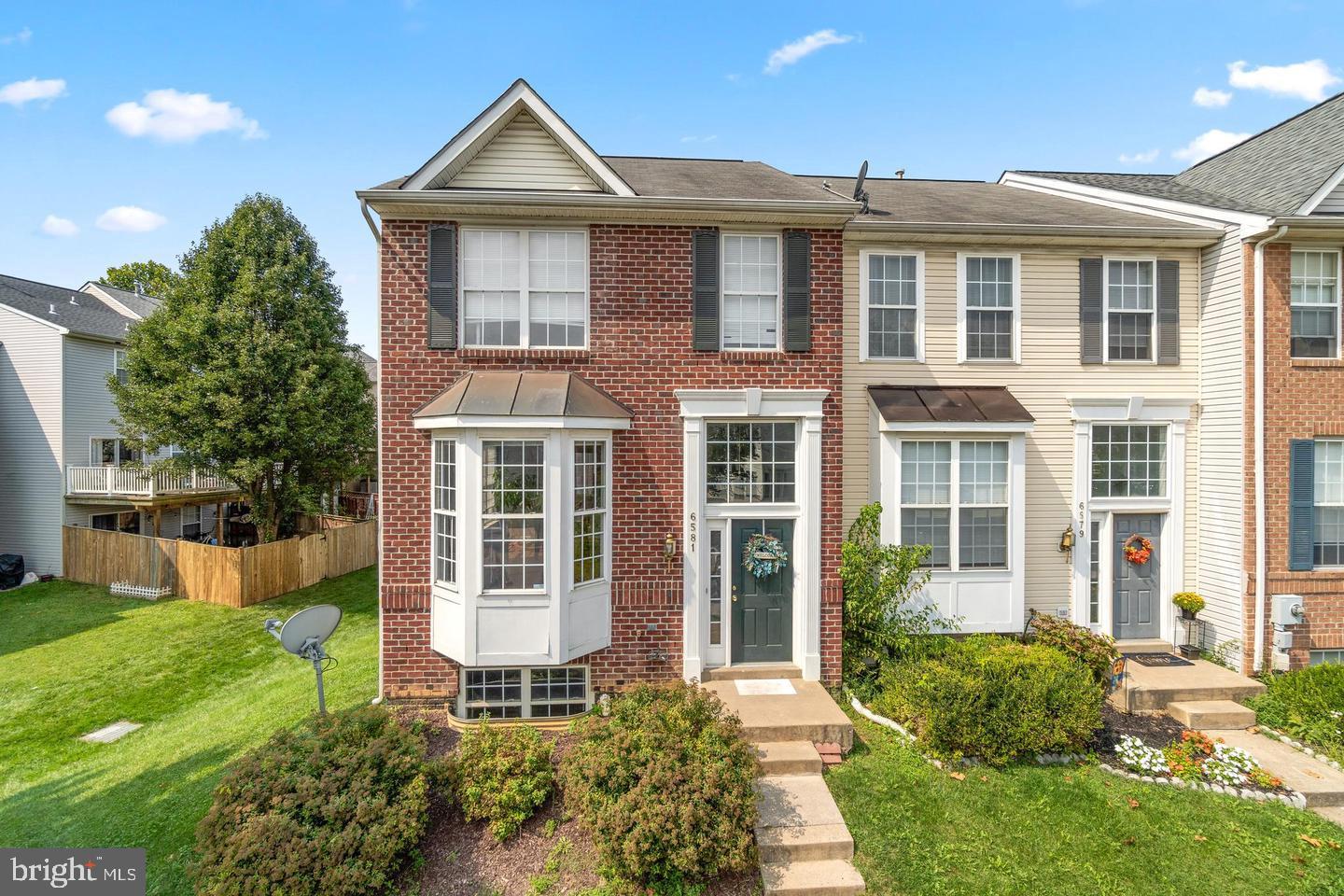 Welcome to this exquisite end-unit townhouse in the sought-after Wellington Trace community. Boasting a charming brick front, this home is bathed in natural light and offers an array of desirable features.

Upon entry, you are greeted by gleaming hardwood floors and a soothing palette of neutral paint that flows throughout the main level. The recently renovated kitchen is a chef's delight, showcasing brand new cabinets, state-of-the-art appliances, and elegant quartz countertops. A unique bumpout off the kitchen serves as a delightful reading nook, adding character and versatility to the space.

Step outside onto the expansive deck, complete with newly added stairs leading to the fenced-in yard, perfect for outdoor gatherings and relaxation. For additional entertaining space, there is a lower-level deck, enhancing the home's appeal for hosting guests.

Upstairs, discover three generously sized bedrooms, including a luxurious primary suite with vaulted ceilings, a walk-in closet, and an en-suite bathroom featuring a relaxing soaking tub. The upper level is designed to provide comfort and privacy for every member of the household.

The lower level of this townhome offers even more living space with an additional bedroom and full bath, complemented by stylish LVP flooring and a separate recreation area. This versatile layout ensures ample room for both daily living and entertaining.

Additional features include a new roof installed in 2022, ensuring peace of mind and added value to this already remarkable property.

Located in the heart of Wellington Trace, this townhouse offers convenience and community amenities, making it a standout choice for discerning buyers seeking comfort, style, and functionality. Don't miss your chance to call this exceptional property your new home. Schedule your showing today!