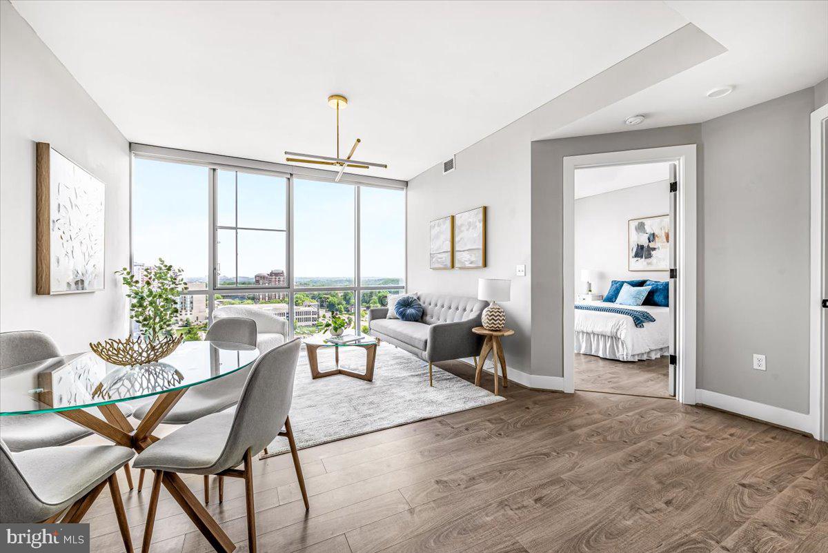 Perched on the 18th floor of 930 Rose, this 1 bed / 1 bath condo is more than home, it's a lifestyle.  The floor-to-ceiling views, wood floors, KitchenAid appliances, in-unit laundry, extra storage and an assigned garage spot are all yours.  The building has a dog run, fitness center, full concierge service, and enough amenities to make every get-together fun: a rooftop bar for entertaining guests, a roof patio with BBQ for when the weather cooperates, and a rec room with a pool table for when it doesn't.

Pike & Rose is at your doorstep. Julii's French Mediterranean, Summer House Santa Monica, Caruso's Grocery, Hello Betty, Kusshi, Owen's Tavern, and Call Your Mother Deli all within a short walk — along with Pinstripes for bowling and bocce, iPic for luxury movie nights, AMP by Strathmore for live music, and Sunday Morning Bakehouse when the croissant urge strikes. Shopping covers REI, Sephora, West Elm, and more.

The White Flint Metro (Red Line) is right across the street. DC in 30 minutes, no car required.
930 Rose isn't just an address — it's a lifestyle that runs on good food, walkable streets, and the quiet confidence of knowing you chose exactly right.