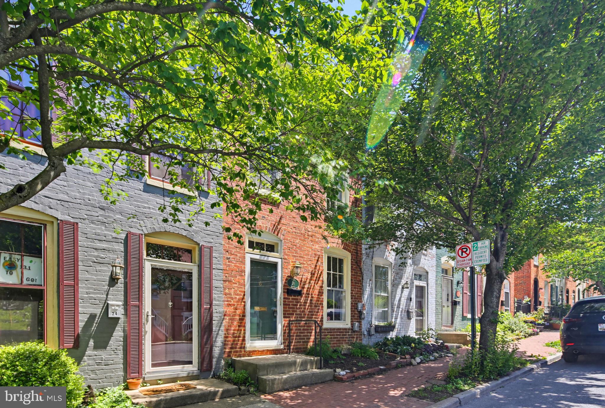 Beautiful 102 year old downtown Frederick brick rowhouse is ready and waiting for you. The main level features an updated kitchen with marble counters and updated stainless steel appliances, along with separate living and dining rooms with hardwood floors. Upstairs you will find two roomy bedrooms, both with hardwood floors, and the updated full bath that leads to a small deck. The backyard is fully fenced. Ductless mini-split cooling and heating units installed two years ago on the main and upper floors. All of the hardwood flooring in the home is the original hardwood. Just a few short blocks from all that downtown Frederick has to offer!