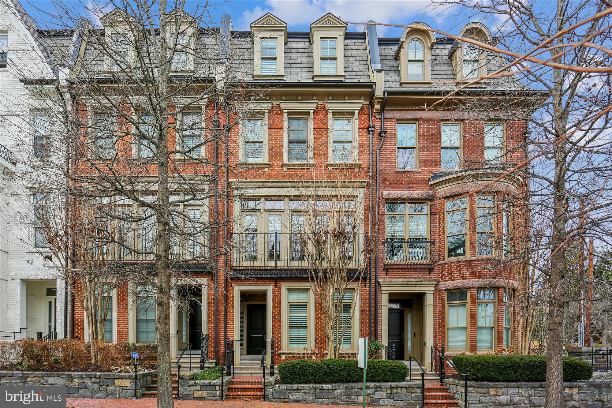 Welcome to Symphony Park an amazing exclusive enclave of elevator townhomes featuring world-class architecture, exquisite design and elegant finishes throughout.  Fall in love with this spacious and light filled 3360 square foot, 4-story, 4BR| 4FB| 1HB| 2-Car Garage with elevator access across all four floors.  EV Charger, Smart-Home features thru-out; built by Michael Harris!  

* The Main Entry has an elegant Entry Hall with coat-closet, guest bedroom/or den with ensuite bath, media/or exercise room now being used as storage, 2-Car garage w/EV charging outlet and elevator access from inside garage and also main level entry hall. Utility closet in garage w/New HVAC-zone 1 of 2

 * Upper level 1:  Open-concept living and dining areas which create an ideal setting for entertaining, and flexible furniture arrangements.  A Gourmet Kitchen boasts 42" upper cabinets, granite tops and oversized center-island with built-in shelves, stainless sink and quartz tops.  High-end appliances with Jenn-Air 42" Refrigerator, Viking 36" gas cook- top w 6 burners and convection oven, exhaust hood, 30" wall convection oven and microwave/ convection oven combo, Dishwasher, and large pantry storage.  The Family Room adjoins the kitchen and is enhanced by a coffered ceiling, gas fireplace surrounded by built-in bookcase, French patio doors w transoms to outdoor terrace that has a gas-line connection for grilling.  Powder Room. Elevator.

*Upper Level 2:   Primary bedroom with sitting area, dual walk-in closets, Spa-like bathroom retreat with marble topped double sink-vanity, large shower and linen closet.  Third Bedroom with ensuite bath, linen and laundry closets, Elevator.  

*Upper Level 3 features Family room, with vaulted ceilings, wet bar and bottle refrigeration, ceiling fan and access to expansive outdoor roof-top terrace Great for social gatherings, 4th bedroom w vaulted ceilings and ensuite bathroom, walk-in closet, Utility closet -New HVAC  2nd of 2 zones, Elevator access.

The peaceful & serene community has professionally landscaped courtyards and sitting areas for your outdoor enjoyment.  Located just steps to Grosvenor/Strathmore Metro and The Strathmore Music Center and Mansion and the areas finest shopping, dining, recreation, parks and more...You'll be proud to call this turn-key home your own.