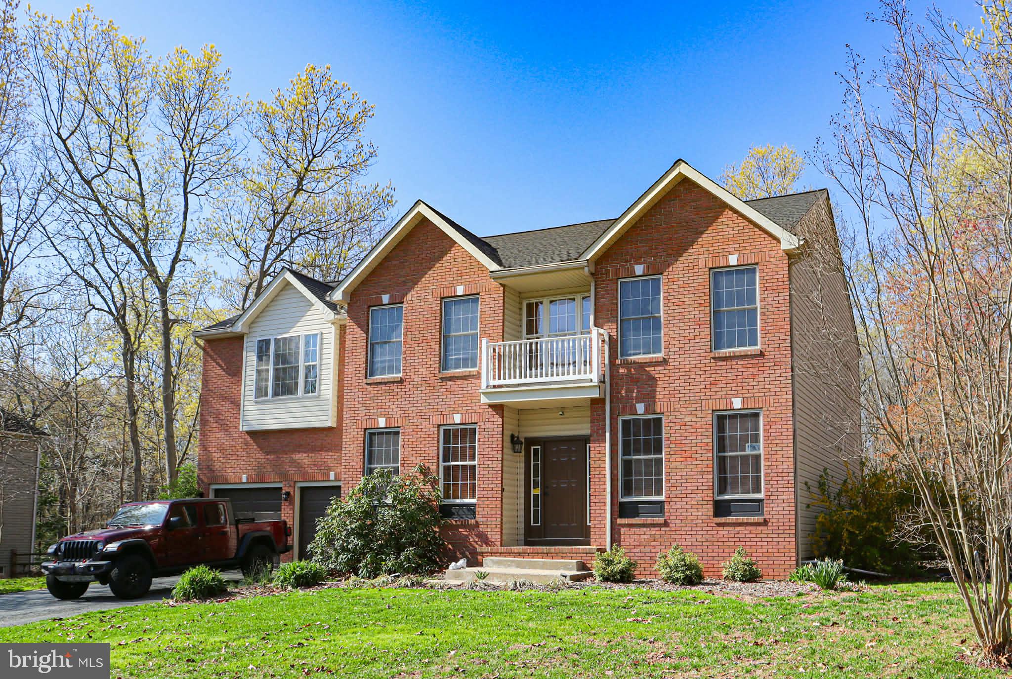 Welcome to your private retreat!  Just in time for summer!  Located within minutes to water access.  This stunning brick-front colonial offers timeless curb appeal paired with modern updates and an incredible backyard oasis.
Step inside to discover light-filled living spaces designed for both comfort and entertaining. The beautifully updated kitchen (2021) is a true centerpiece, offering modern finishes and style that will impress any home chef. The home also boasts generously sized rooms, a finished lower level, and thoughtful details throughout. The spa-inspired primary bathroom is a true showstopper, featuring elegant tilework, a soaking tub, and a separate walk-in shower—perfect for unwinding at the end of the day. Upstairs bathrooms were fully updated in 2026, adding even more modern appeal.
Major system upgrades provide peace of mind, including a new roof (2024), water softener with Culligan reverse osmosis and uv filtration, furnaces replaced in 2025, upstairs A/C replaced in 2025, downstairs A/C replaced in 2019, and UV ozone-free filtration systems installed in both HVAC units in 2026.  As an added benefit the wood-stove is capable of heating above-grade finished areas to offset heating expenses.  
Out back, you’ll find your own personal paradise. Enjoy warm summer days by the lifetime warranty radiant in-ground saltwater pool, relax on the expansive deck, or entertain guests in the covered area—ideal for outdoor dining and gatherings. Surrounded by mature trees, the fenced backyard offers both privacy and tranquility.
This home perfectly blends classic style with modern comfort, making it an exceptional opportunity you won’t want to miss!