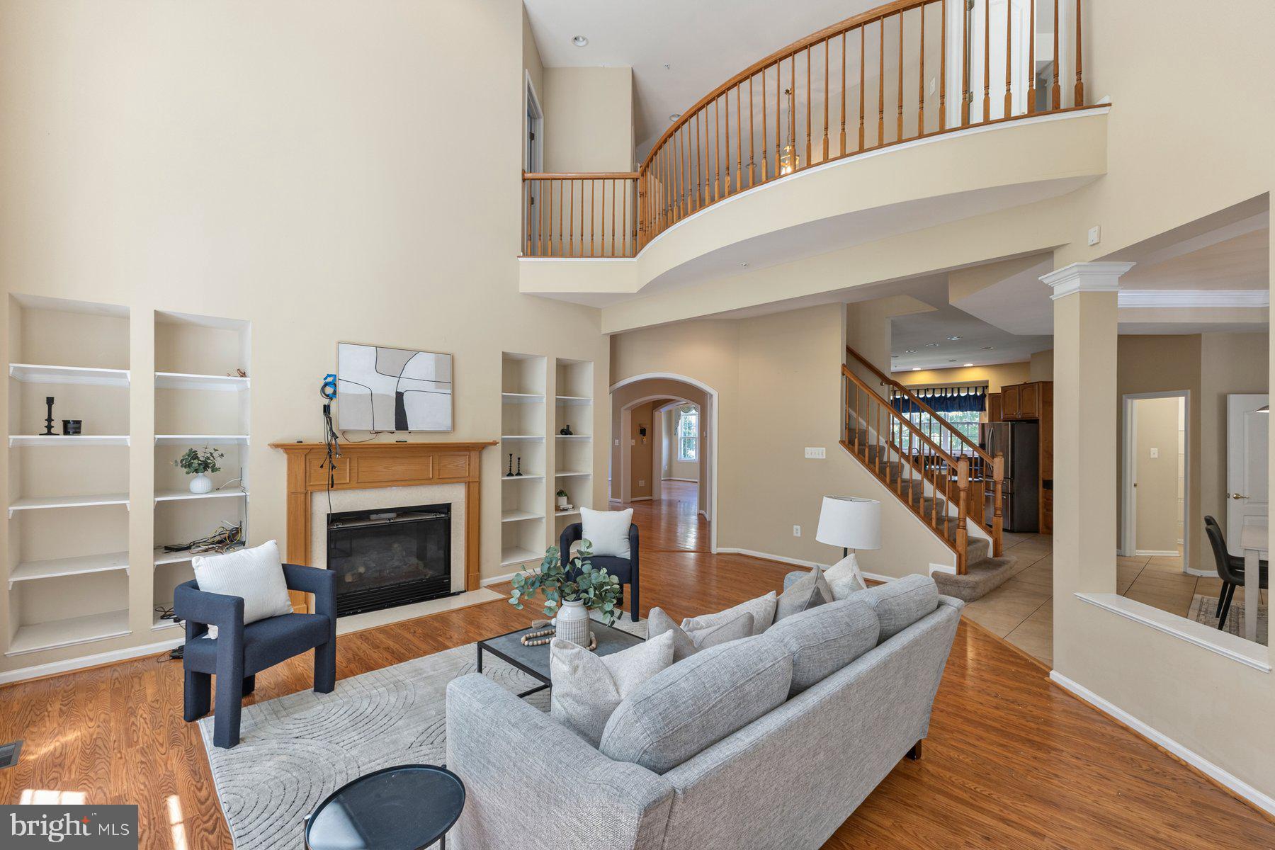 Luxury living on 2.2 private acres in prestigious Manning Preserve! This stunning 5-bedroom, 4.5-bath colonial offers over 5,300 sq ft of beautifully finished living space, an oversized 2-car garage, and a finished walkout basement designed for entertaining. The main level features hardwood floors, a dramatic two-story family room with gas fireplace, executive office, formal dining room, sunroom, and a gourmet kitchen with granite countertops, cherry cabinetry, large island, butler's pantry, walk-in pantry, double dishwashers, and commercial-grade 6-burner gas range. Upstairs, the luxurious owner's suite boasts a private balcony, fireplace, spa-inspired bath with soaking tub and oversized walk-in shower, and an enormous walk-in closet. Additional bedrooms offer generous space and multiple en-suite bath options. The walkout basement includes a custom bar, full bath, bonus bedroom/office, salon space, and expansive recreation area. Outside, enjoy a Trex deck, hardscaped patio, built-in fire pit, and beautifully landscaped grounds. Conveniently located near National Harbor, Joint Base Andrews, Washington, D.C., and major commuter routes.
