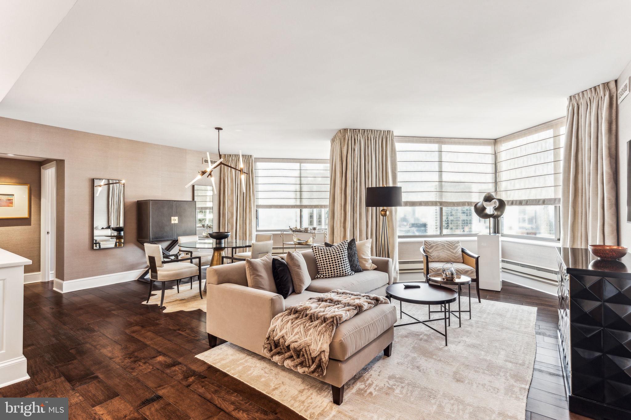 Step into this stunning 2-bedroom, 2-bath residence at The Rittenhouse Condominium, where luxury amenities and outstanding service seamlessly intertwine, all while enjoying the unparalleled privilege of living directly on Rittenhouse Square. The open and inviting living and dining area welcomes you with sweeping north-western views of the cityscape and sunlight creating a bright and airy space perfect for both relaxation and entertaining. Flowing effortlessly from the living area, the gourmet kitchen is a chef’s dream, featuring top-of-the-line built-in Miele appliances,  Sub-Zero refrigeration, sleek quartz countertops, custom cabinetry, and a peninsula that serves as the perfect perch for a glass of wine with the chef.  The thoughtfully designed split floor plan ensures both privacy and comfort, with the primary suite positioned on one end of the residence. This serene retreat boasts abundant walk-in closet space and a spa-like marble bathroom complete with a glass-enclosed shower and elegant finishes. On the opposite side of the home, the second bedroom offers generous closet space and access to a beautifully appointed marble bathroom with a glass-enclosed tub and shower combo, ensuring every detail exudes sophistication.  There is the added convenience of an in-unit laundry station and zoned heating and cooling.   Beyond the residence itself, living at The Rittenhouse means indulging in a lifestyle of convenience and luxury. Residents enjoy access to world-class amenities, including 24-hour concierge and doorman services, and for an additional cost, you have access to the hotel's full-service spa, state-of-the-art fitness center, indoor pool, valet parking, room service, housekeeping services, laundry services, and exclusive dining discounts at renowned on-site restaurants such as Lacroix, Scarpetta, and the Library Bar. Step outside, and you’re immersed in the vibrant energy of Rittenhouse Square, with its lush park, upscale shopping, award-winning dining, and cultural attractions just steps from your door. Whether you’re seeking a full-time residence or a refined urban retreat, this home offers the perfect balance of opulence and comfort in one of Philadelphia’s most prestigious addresses. Every detail, from the thoughtfully designed layout to the top of the line finishes and exceptional building amenities, has been carefully curated to provide an extraordinary living experience that is second to none.