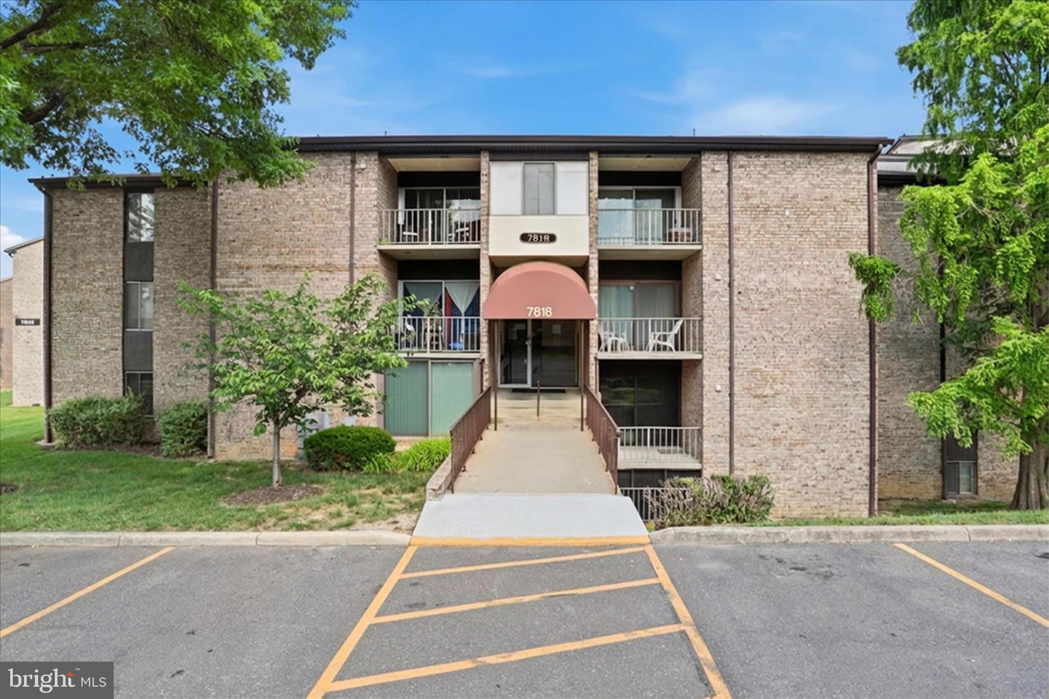 Welcome to this spacious and beautifully maintained ground-level condo in the heart of Greenbelt! Offering 2 bedrooms, 2 full bathrooms, and 1,188 square feet of comfortable living space, this freshly painted home features luxury vinyl plank (LVP) flooring throughout the main living areas, plush carpet in the bedrooms, an eat-in kitchen, in-unit washer and dryer, and a screened-in porch perfect for relaxing morning coffee or evening unwinding. Access controlled building entry. 

The condo fee includes ALL utilities plus access to outstanding community amenities including an outdoor pool, tennis courts, volleyball court, clubhouse with rentable party room, picnic areas, reserved resident parking, and ample guest parking. FHA approved and ideal for first-time buyers, down-sizers seeking low-maintenance living, or investors looking for a solid opportunity.

Conveniently located near parks, lakes, shopping, restaurants, I-495, BW Parkway, NASA, and the University of Maryland. Zoned for highly sought-after Eleanor Roosevelt High School. This is comfort, convenience, and value all in one!
