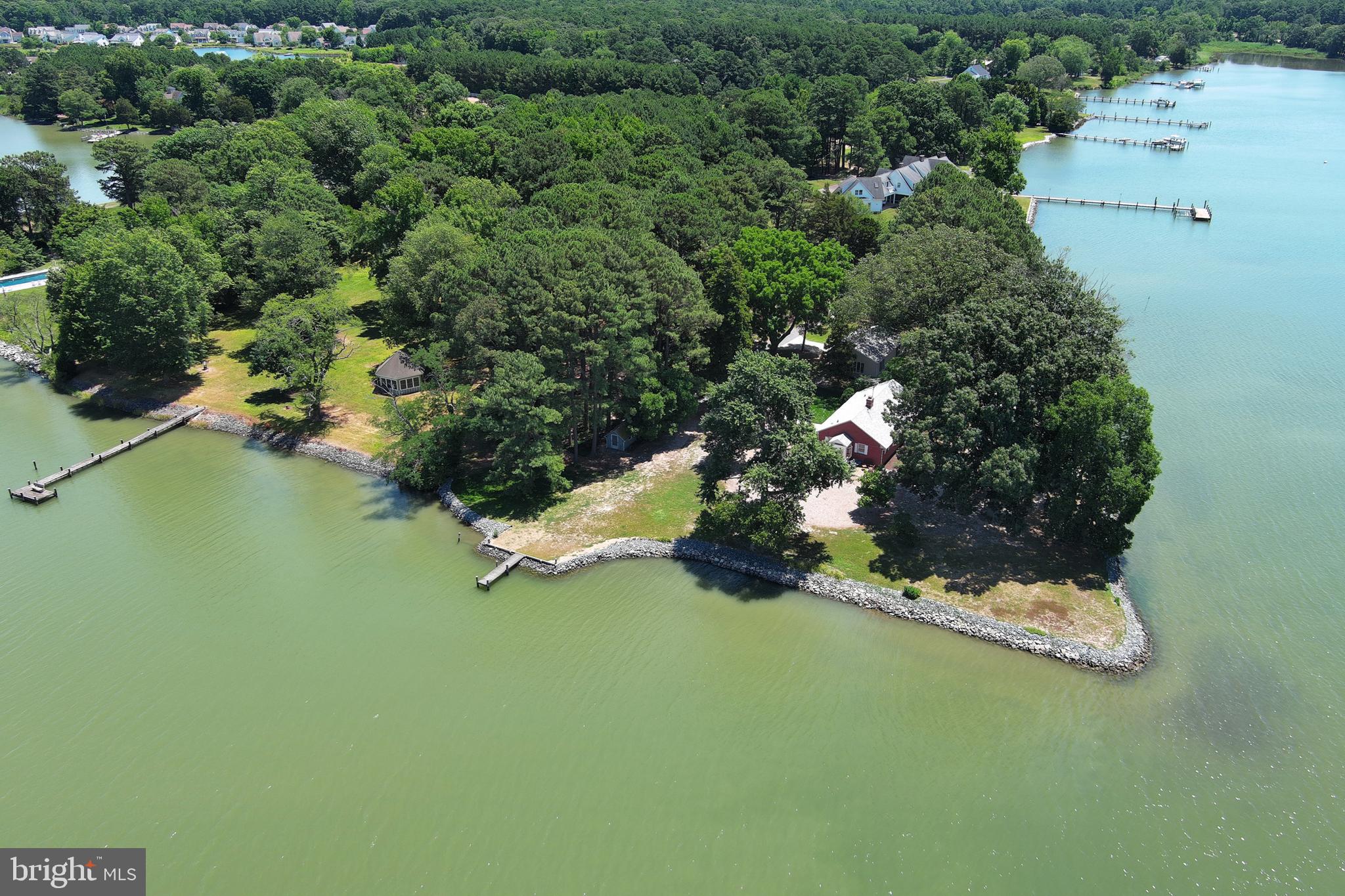Location, Location, Location ......it doesn't get any better than having a spectacular point of land on San Domingo Creek and be located right outside  historical  St. Michaels. Breathtaking sunsets and water-views surround this well-maintained , charming 3 bedroom/1.5 bath brick rancher.  Updating the home would make it the perfect primary residence or a second home.  No variances needed to add on a second story ......just the typical County building permits. There is a garage with an attached heated office/workshop .  The extensive shoreline is protected by rip -rap and no flood insurance is required. Professional photos, floor-plan, and plat will be uploaded before Saturday June 22nd. ( actual size of the property is approximately 2.7 acres , including road/driveway and easement.