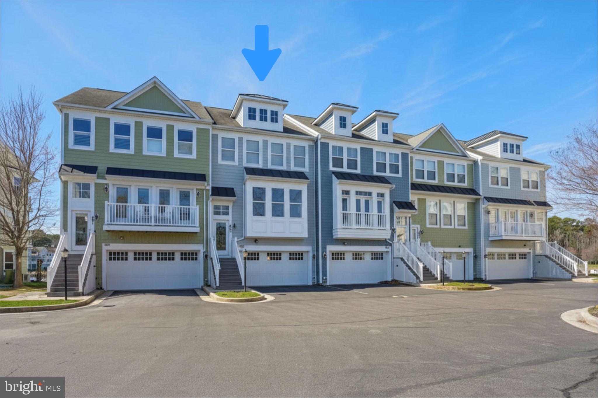 Welcome to 10900 Holystone Lane #402, a refined waterfront townhome tucked within the prestigious gated community of Glen Riddle... just minutes from the beaches, dining, and vibrant energy of Ocean City, Maryland. Perfectly positioned on a private “island” enclave within the sought-after Marina Villas at Glen Riddle, this exceptional residence offers a rare blend of low-maintenance luxury and resort-style living.  Overlooking the marina, this light-filled home offers truly extraordinary views that elevate everyday living into something special. From nearly every window, enjoy a dynamic coastal panorama where nature and waterfront life unfold before you. Watch bald eagles and osprey soar overhead, often returning with their latest catch, while boats glide in and out of the marina below. In the quieter off-season, the setting transforms into a peaceful retreat, while summer brings a lively, ever-changing scene, with the nearby boat ramp offering a front-row seat to all the action and a source of endless, built-in entertainment. This is a home where the views are not just beautiful...they are an experience.  Thoughtfully designed, the residence features three spacious bedrooms and three-and-a-half baths, with a flexible entry-level living space that can easily serve as a fourth bedroom, guest suite, or private retreat. The open-concept main living area invites effortless entertaining, while expansive windows flood the home with natural light and frame the stunning waterfront backdrop.  Lovingly maintained and very gently lived-in, this home reflects pride of ownership throughout. A recently replaced HVAC system offers added peace of mind, while the attached garage provides convenience and additional storage. Within the Marina Villas condominium association, exterior maintenance, including landscaping and upkeep, is expertly managed, allowing homeowners to enjoy a truly lock-and-leave lifestyle ideal for both full-time living and vacation use.
Glen Riddle is renowned for its amenity-rich environment, offering residents access to a private marina, two championship golf courses, a clubhouse with dining (Ruth's Chris Steak House), fitness center, outdoor pool, pickleball/tennis courts, and scenic walking trails. Boating enthusiasts will appreciate the opportunity to purchase or lease boat slips within the community, enhancing the coastal lifestyle experience. Whether you’re seeking a primary residence or a sophisticated second home, this exceptional property delivers unmatched views, convenience, and access to one of the area’s most coveted communities. Experience waterfront living at its finest...where every day feels like a getaway.