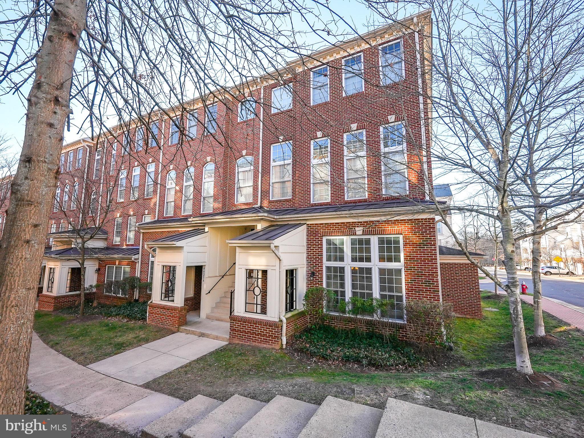 ** Offer deadline Monday, 2/12, at 5pm**

Welcome to this hidden gem - a condo disguised as a townhouse! Nestled in a vibrant community, this beautiful 2-level end-unit townhome boasts convenience, comfort, and charm.
Step inside to discover 2 bedrooms, 2.5 baths, and an attached garage - offering both functionality and style. The open layout invites you into a bright living room, with huge windows, perfect for relaxing or entertaining guests.  The modern kitchen is equipped with all the essentials and features a new stove and microwave.  Additional highlights include a gas fireplace for cozy evenings, upper floor laundry for added convenience, and a garage spot for your vehicle.
Enjoy the ease of urban living with amenities just steps away - from Wholefoods, Wegmans, restaurants, to Starbucks. Need to run errands? Fair Oaks Mall and Fair Lakes Shopping Center are less than 5 minutes away. Commuting is a breeze with a FREE SHUTTLE SERVICE to Vienna Metro.
Don't miss the chance to make this delightful home yours. Schedule a showing today and experience the best of both worlds - condo living with the feel of a townhouse!