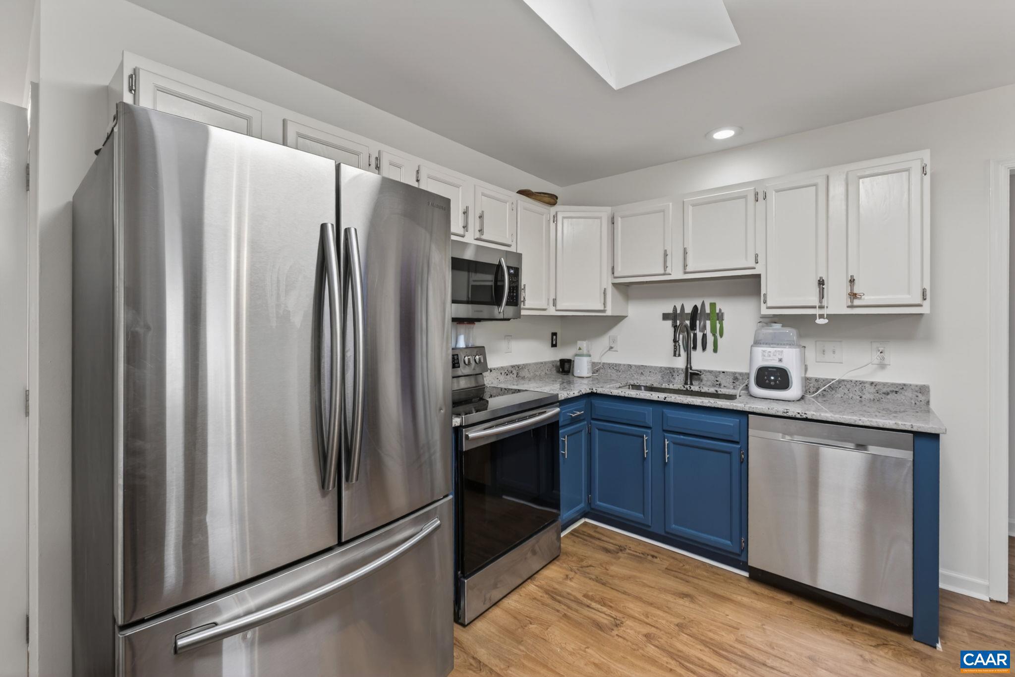 Wonderful move-in ready home near Beach 4! This lovely home all on one level features 3 nice sized bedrooms and 2 full baths along with a nearly level back yard. The owners have done everything so all your clients have to do is move in! Brand new roof (August '25). April- 2026: New HVAC (with 10yr transferrable warranty), new flooring in FR/Kitchen/guest BRs, new kitchen counters/sink/faucet and new deck & interior paint.  This home offers tons of natural light and open Kitchen, living room & dining area with vaulted ceilings & sliding doors to rear deck & back yard. Split bedroom design with primary bedroom and bath at front of home offering tons of privacy. This home won't last long!,Granite Counter