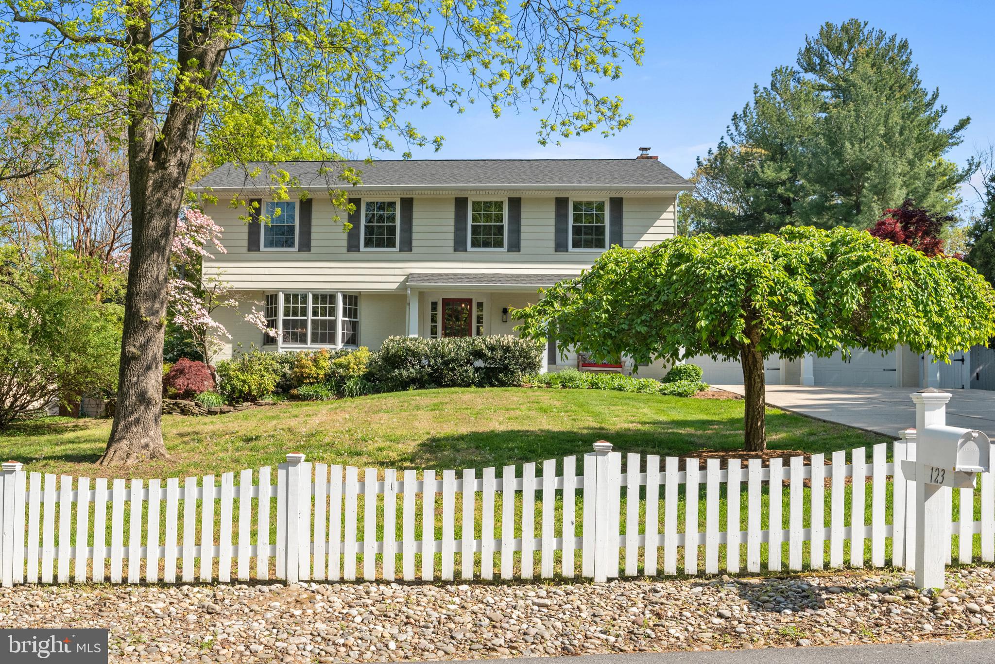 Located in the heart of the coveted community of Bay Ridge, this 4 Bedroom, 2 1/2 bath  Colonial is situated on a double lot with a spacious, flat, fenced rear yard great for pets, trampoline and gardening.  It offers all the privacy and outdoor space you could want including a paver patio, pergola and outdoor shower! Step inside to find a bright interior, updated eat-in  kitchen located off the family room with fireplace and a recently renovated sunroom overlooking the patio and back yard.  Spacious living room opens to dining room with views of rear grounds. Hardwood floors on the first and second floors.  Spacious primary suite with renovated bath and walk in closet. Three additional bedrooms, hall bath and laundry. Lower level has great finished space with exercise room and office and outside entrance to rear yard.  Oversized two car garage with additional parking for 8  cars in driveway plus double gate along side of garage for parking small boat or playing basketball!  Located minutes from the Bay Ridge community pool, marina and beaches. Bay Ridge is a Special Tax Assessment District and membership dues of $250/year are encouraged in this amenity rich community.