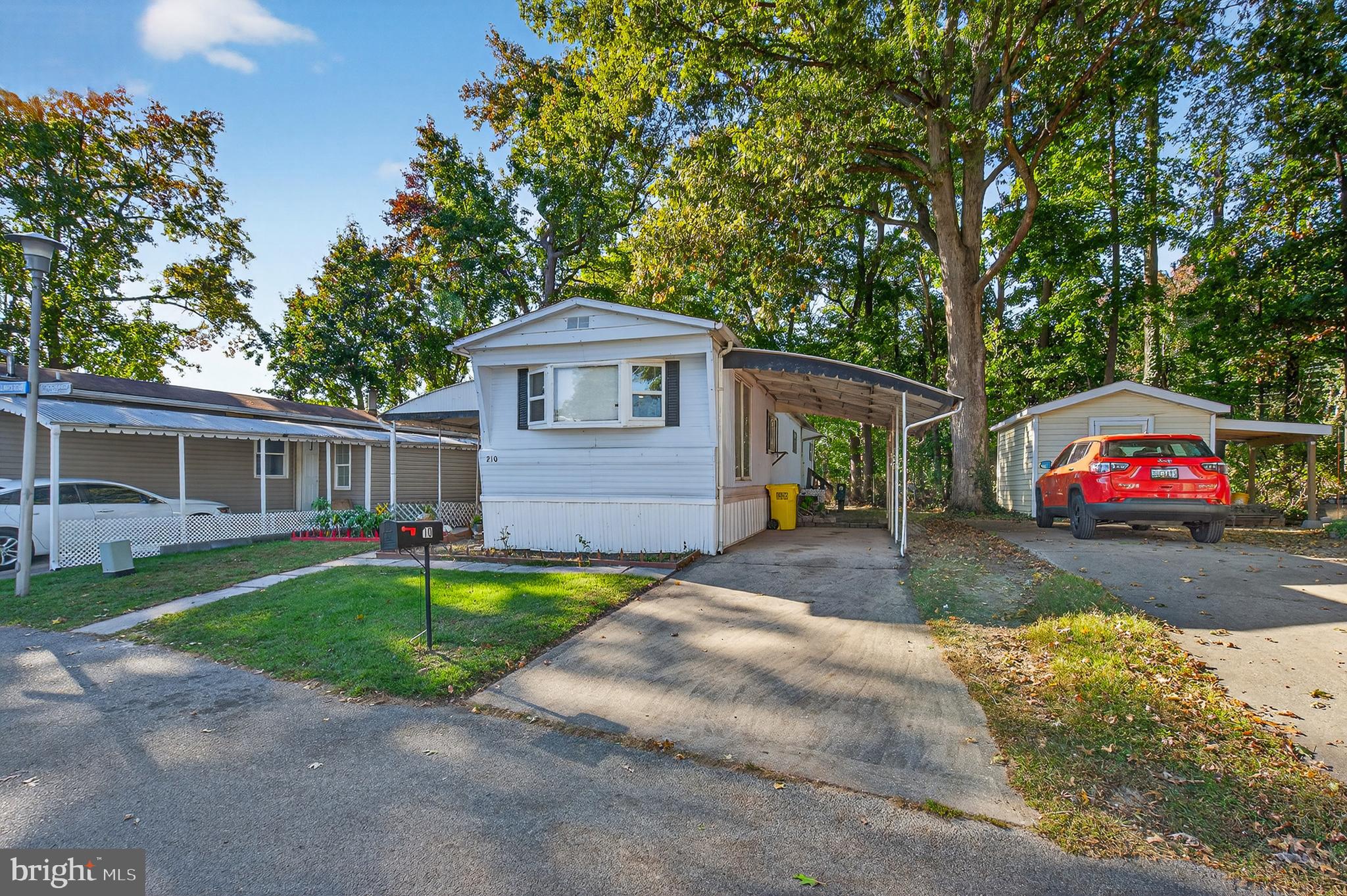 Welcome to 210 Trailway Road! This beautiful 2-bedroom, 1-bath manufactured home is move-in ready and full of potential. You’ll love the open concept, recessed lighting throughout, central A/C, and the convenience of having your own washer and dryer.

Outside, enjoy a nice yard with a covered patio, perfect for relaxing or entertaining and a private driveway and a spacious shed for extra storage. A great home that’s ready for you to make it your own!

MUST GET PRE-APPROVED BY WILLIAMS ESTATES- PEPPERMINT WOODS