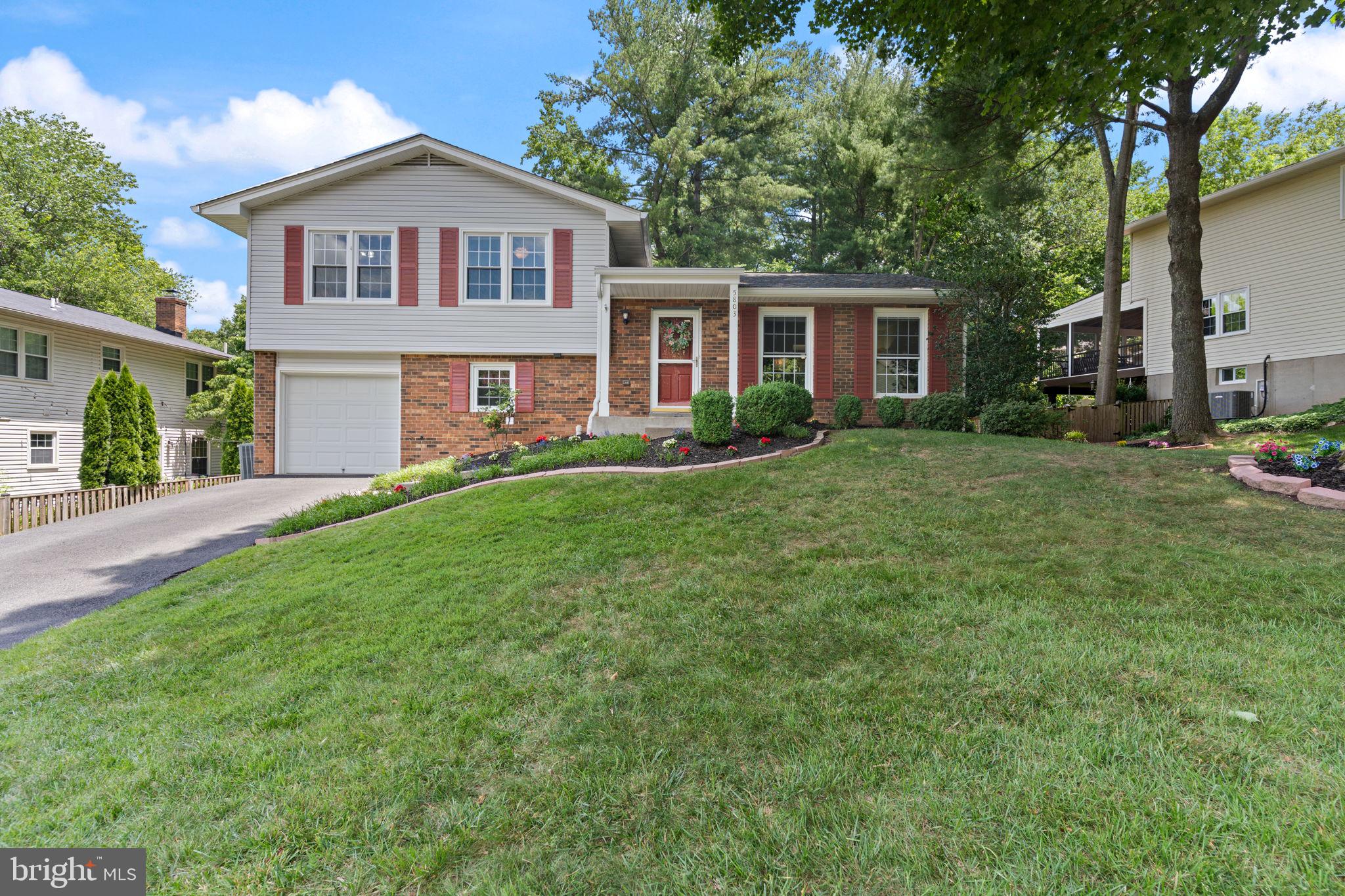 Open House Saturday June 20, 12:00-2:00! Absolutely immaculate fully finished four level split level located on a cul de sac in Burke Center. Main level Hardwood floors have all been sanded and refinished. Roof 2021. Water Heater 2025. Deck 2026. Refrigerator 2022. Living room with large windows and freshly painted. Formal dining room with chandelier and chair rail molding. Sliding glass door leads to brand new oversized wood deck overlooking the huge fenced rear yard. Kitchen is every chef's delight. White cabinets and new hardware. Stainless Steel appliances and enough room for table & chairs. Upper level includes a primary and two large secondary Bedrooms with ceiling fans, large closets with extra double hanging and brand new plush carpet. Updated hall bathroom with shower/tub. Primary Suite with new carpet, large closet and full bathroom with shower. Family Room one level Down includes easy access to the one car garage and door to rear yard. You will love the privacy nestled next to the brick wood burning fireplace. Laundry and utility room make it easy for any homeowner. Lower level offers another Family Room, the 4th Bedroom ( NTC) and extra storage rooms.