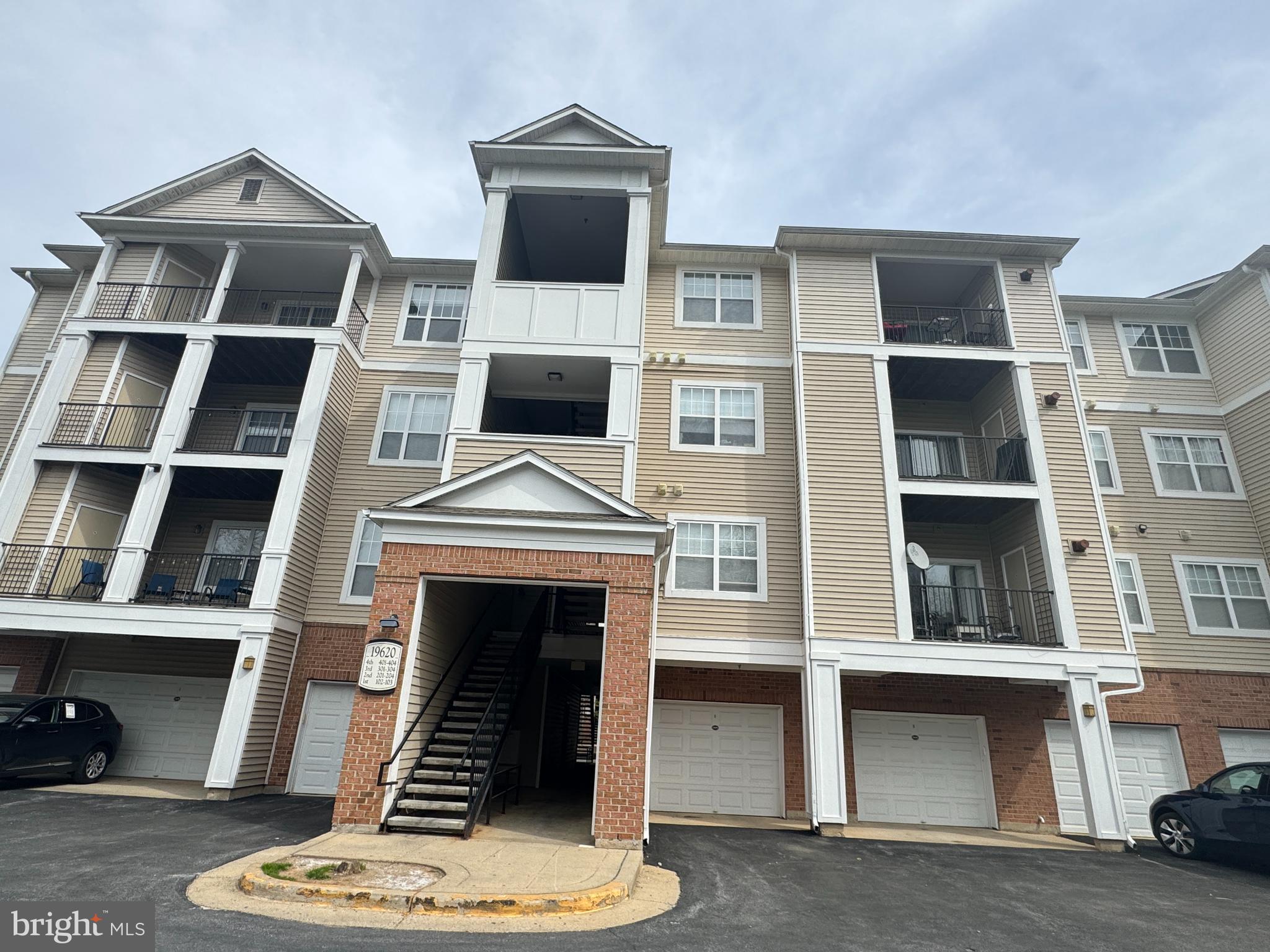 Spacious, move-in ready condo with 1365 sq.ft on ground floor in a great commuter location! The large living area with dining opens to a outdoor patio for relaxing. Two extra-large light-filled bedrooms and large bathrooms with walk in closets! Full size laundry washer/dryer right inside unit. There is an indoor garage, parking in front of the garage as well as one reserved parking space(total three parking spaces). Entry from garage to breezeway that leads you to the condo so you won't have to go out in the rain/snow. Great amenities are included with this beautiful home: fitness center, pool, hot tub, clubhouse, playground… etc.  Convenient location near Germantown Town Center, restaurants, Germantown Soccerplex, Wegmans, Top Golf and more. Easy access to I-270 and the MARC train. . Don't miss your opportunity to rent this lovely Condo!