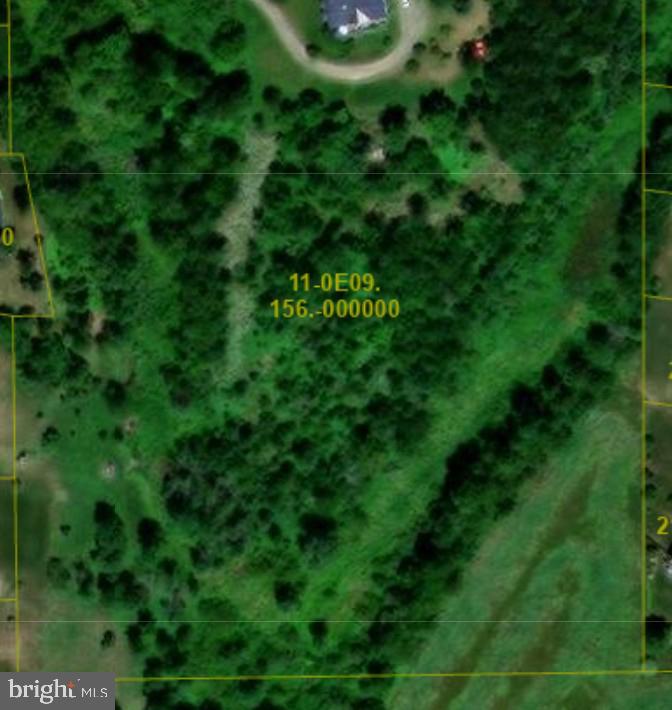 Bring your builder and take advantage of over five acres offering peaceful surroundings and scenic views. Enjoy quiet mornings with nature and occasional wildlife sightings. Public water and sewer connections are available. Tucked along a private road while still just minutes from shopping and everyday conveniences. A great place to slow down and start a dream build!