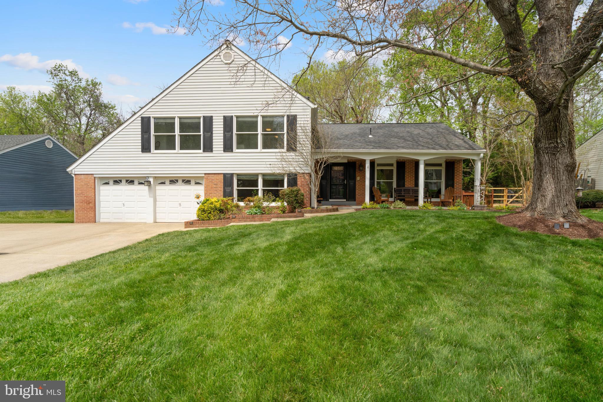 Tucked away in Potomac Commons, this charming home backs to serene forest conservation with a peaceful meadow, creek, and sandy beach—your private escape. 
Inside, a stunning new kitchen shines with quartz Cambria counters, KitchenAid appliances, custom cabinetry, spacious island with embedded microwave, large gas cooktop and double ovens. The warm whitewashed fireplace and built-ins add character, while fresh paint, oak hardwood floors, and recessed lighting create a welcoming feel throughout. Enjoy 3 bedrooms, a primary suite with en-suite bath, plus a main-level bonus room that could be a bedroom or office space. The finished walk-out basement includes a full bath. Major updates: 2 HVACs, water heater (2021), newer roof/siding, new gutters with gutter guards, new fence, upgraded electrical panel, and freshly painted walls throughout the home. 
Outside, relax on the expansive deck, fantastic for entertaining. Garden in fertile soil, or enjoy berries from your own bushes. Nearby parks, convenient shopping , and major commuter routes, this home blends comfort, style, and nature beautifully. Offering over 2,000 square feet of living space, this exceptional home invites you to discover a lifestyle defined by comfort, thoughtful design, and natural beauty.