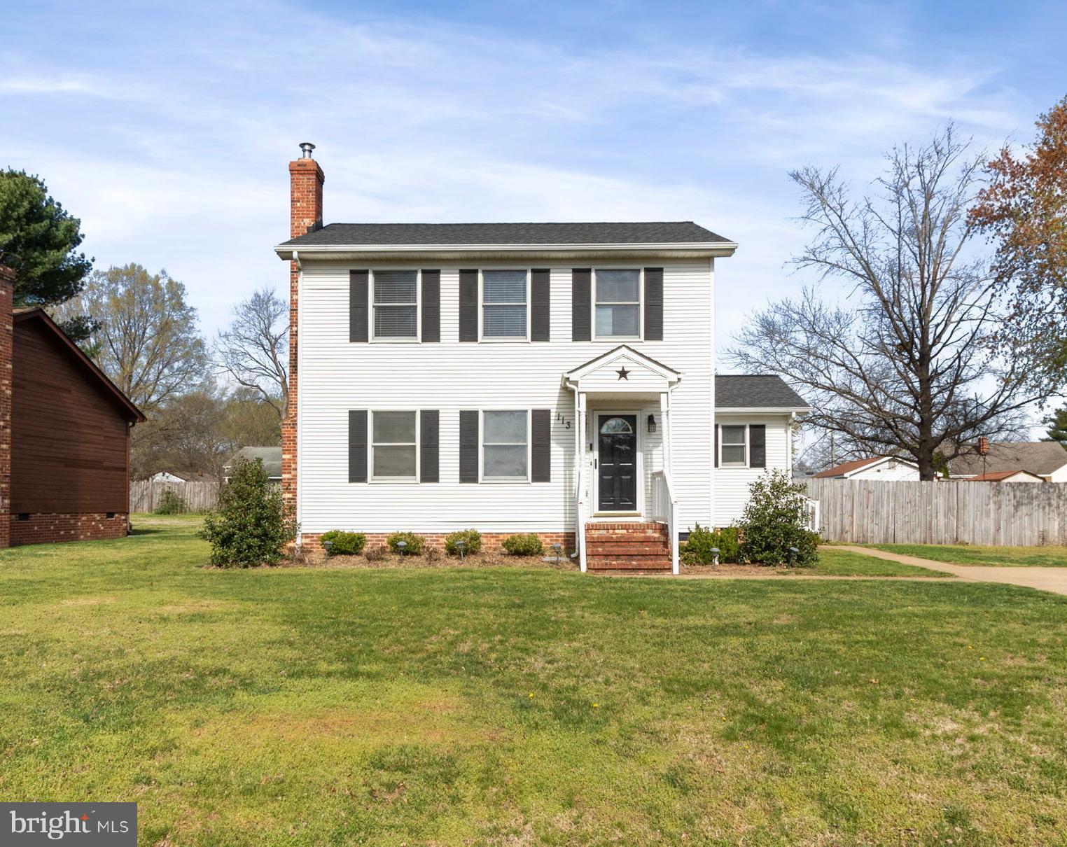 This charming Colonial-style home offers timeless elegance with modern updates. Featuring three spacious bedrooms and 2.5 baths, the home also offers lots of outside living space. Luxury vinyl plank (LVP) flooring has been installed throughout the home, combining durability with a sleek aesthetic. The open living room is complimented by a cozy wood-burning fireplace that provides warmth and character, making it the perfect spot to relax. Come on in and make yourself at home!
The open-concept kitchen and dining area are designed for both functionality and entertaining, allowing for seamless interaction with family and guests. Large windows throughout the home flood the space with natural light, creating a bright and airy atmosphere. Lots of counter space and cabinets make meal preparation a breeze. A pantry and tons of storage in the laundry room are an added bonus! Upgraded counters with a breakfast bar add modern flair and functionality - grab a quick bite at the counter or sit down for a meal at the dining room table!
The main level is finished out with a powder & large laundry room off the side-door, making it very convenient to access from the driveway. The laundry room has tons of cabinets for storage and extra space to make it a great "landing station" when you first come home!
Upstairs, the large primary bedroom features lots of light, custom blinds and a ceiling fan. The private, remodeled bathroom is a true retreat, offering stylish finishes and modern conveniences. The other two bedrooms are also great sizes and offer lots of light. Low-maintenance floors are continued on this level and make everything flow nicely. The shared hall bathroom has also been updated and there’s an additional hallway closet for storage.
Outside, off of the kitchen, the large covered back deck extends the living space. Enjoy outdoor gatherings or quiet evenings. Relax with the beverage of your choice or fire up the grill! The flat, fenced-in yard provides a perfect space for pets, play, or gardening and a large shed offers even more storage!
With its classic charm, thoughtful updates, and inviting spaces, this Colonial home is ready to welcome you!