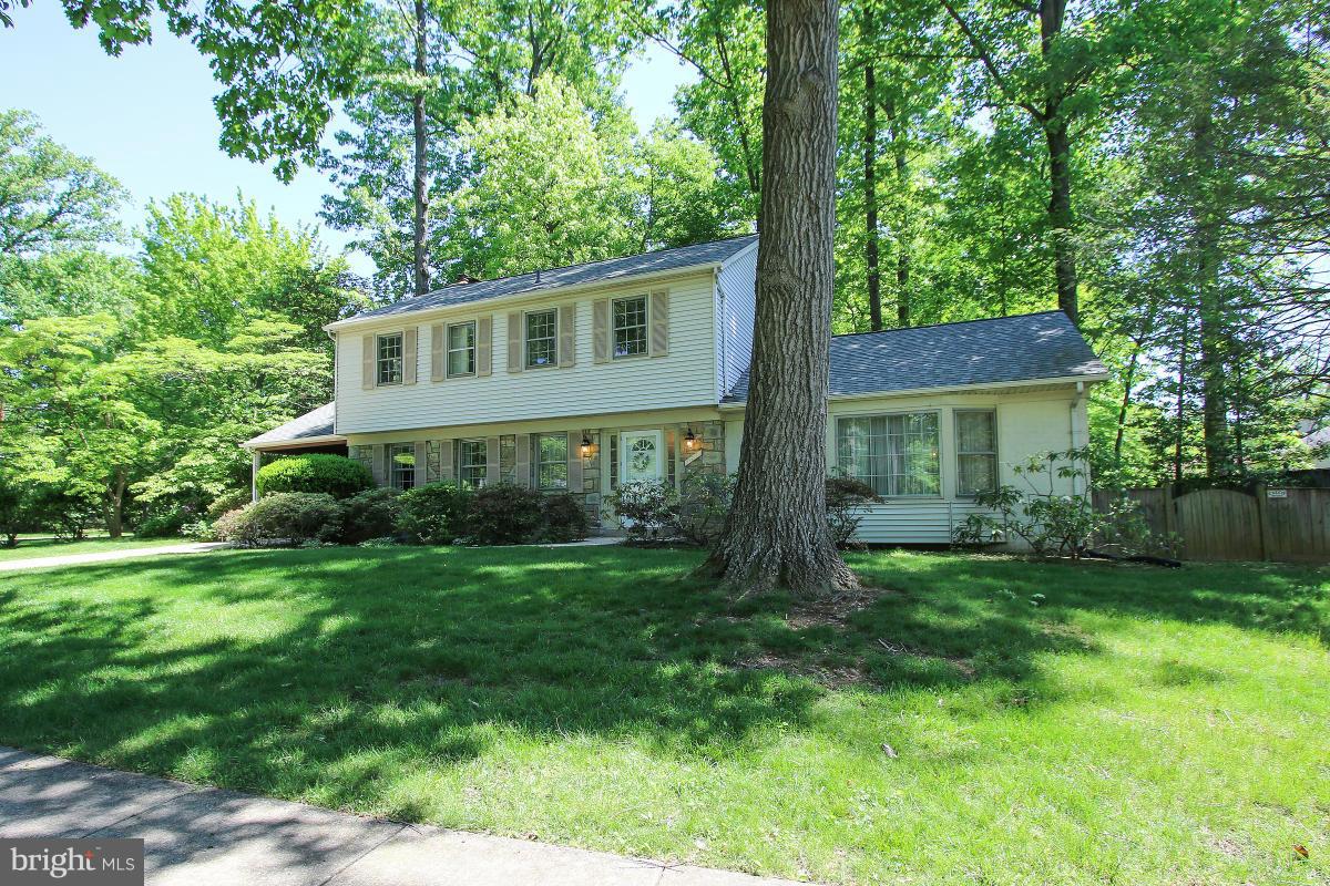 Beautiful 2-story colonial in desirable Woodley Gardens! Gracious foyer, hardwood floors, fresh paint! Bright kitchen, bay window, w dining & storage! Spacious living & dining rooms, light-filled, elegant! Large family room, wood beams, French patio drs, stone fireplace! Lrg 1st floor office. 4 lrg bedrms, ample closets, 2 walk-ins! All bathrooms updated! Park-like backyard! Near Rockville & 270!