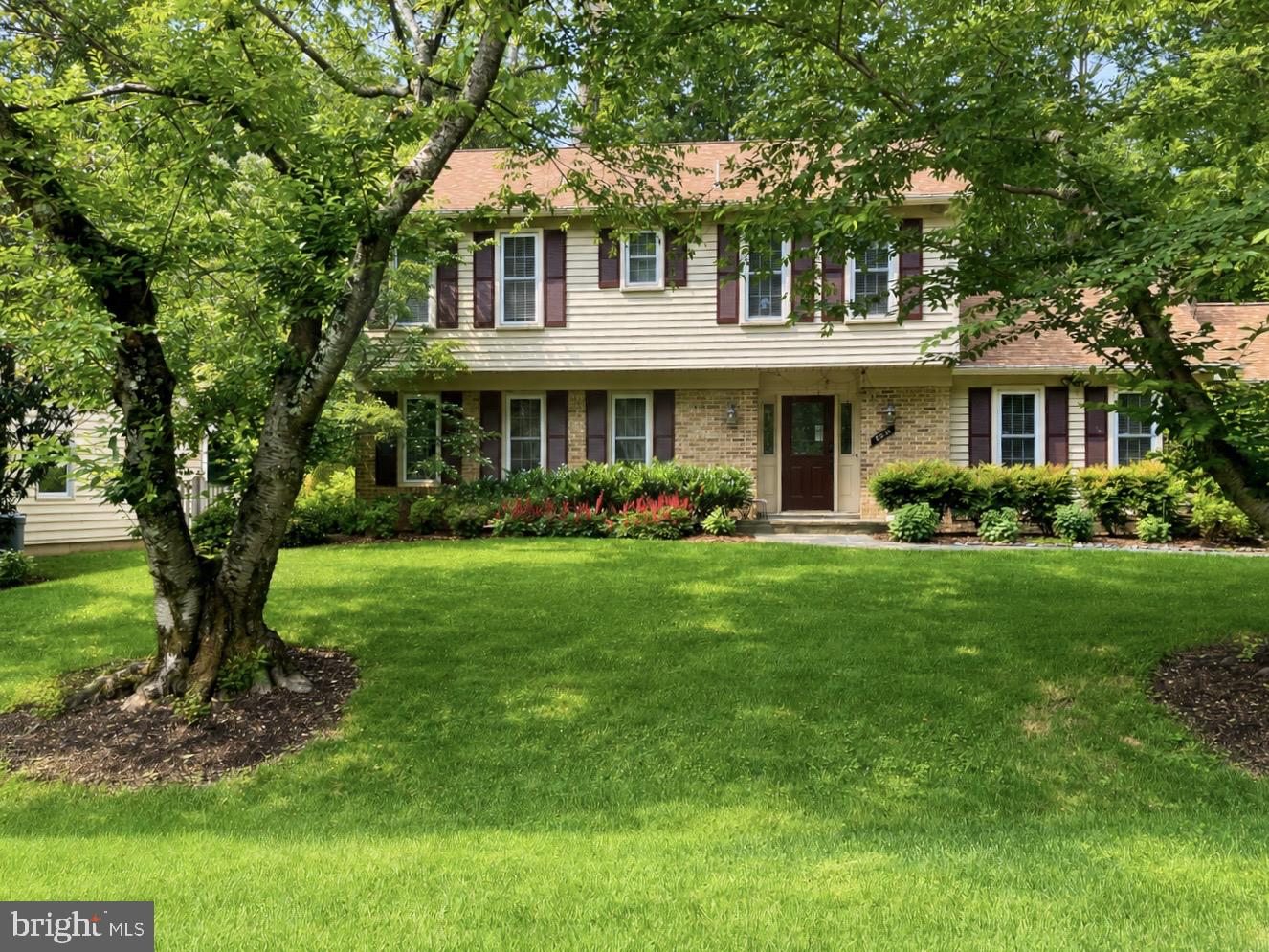 Nestled on a quiet cul-de-sac along a charming cherry tree–lined street, this beautifully maintained and thoughtfully updated home offers exceptional comfort and style. Gleaming hardwood floors flow throughout the main level, which features a gourmet kitchen appointed with granite countertops, stainless steel appliances, a cooktop, and dual wall ovens. The inviting family room, complete with a gas fireplace, is complemented by a convenient laundry and mudroom.
The finished lower level provides versatile living space, including a family room with a whimsical dress-up area, a private office, a full bathroom, and a workshop. Custom closet systems,  kitchen and baths, and a whole-house generator are just a few of the home's standout enhancements.
Outside, an expansive deck overlooks a peaceful, level lot—an ideal setting for entertaining guests or enjoying everyday life in a serene setting.