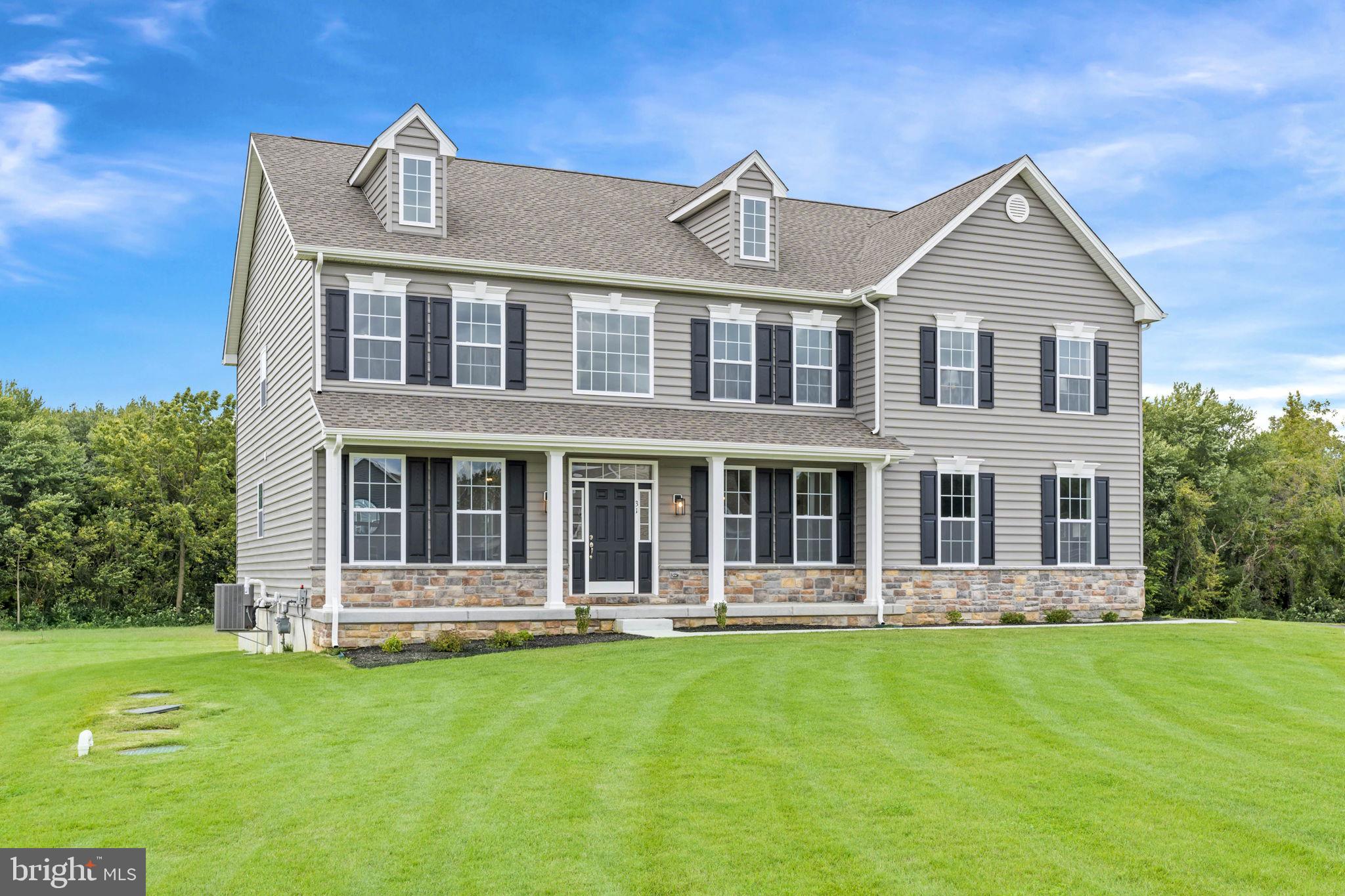 This stunning luxury home brings flexibility and grandeur to family living. The Brandywine features a two-story foyer and family room, a spacious kitchen and breakfast area, formal living and dining rooms, and a first-floor study. A rear staircase leads to the dramatic owner's suite with dual walk-in closets, a spacious sitting room, a luxury bath with a corner soaking tub, and separate linen and water closets. Included features: Gourmet kitchen package with granite countertops, island, double wall oven microwave, separate cooktop, and dishwasher. All appliances are stainless steel. Hardwood flooring in the foyer, kitchen, and breakfast nook. Crown molding in the living room, dining room, and foyer. Chair rail in the dining room. Ceramic tile flooring in the owner's bath. There is a gas fireplace with a marble surround in the family room. The stone water table, side entry garage, and a walk-up basement are also included. There is a long list of standard features.
Mount Friendship is just 15 minutes from the state's capital, Dover, which offers major shopping centers, tourist destinations, and several universities and colleges. Easy commute to the Delaware beaches in just over an hour and local shopping. THIS IS A TO-BE-BUILT HOME. The pictures shown are not of the actual home. Pictures are for marketing purposes only. The square footage is estimated. For additional information about this to-be-built home, visit the model at 31 Summit Dr. If you are working with a realtor, the agent's client must acknowledge that a realtor is representing them during their first interaction with JS Homes. The realtor must accompany the client on the first visit.