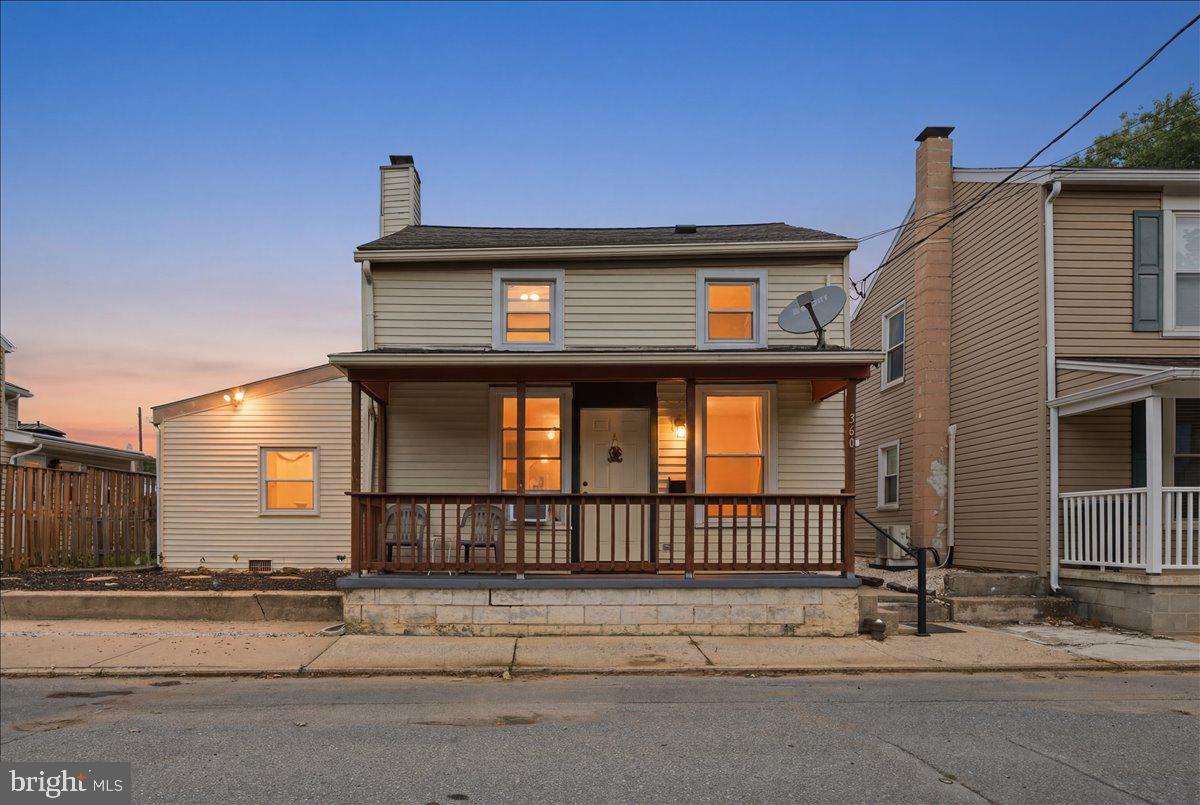 Welcome to this charming 3-bedroom, 2-full bath home in the highly sought-after Donegal School District, conveniently located in the heart of Marietta and outside the flood zone. The spacious kitchen and dining area is the heart of the home, featuring solid wood cabinetry, ceramic tile flooring, and plenty of room for gathering and entertaining. Another significant feature in this home is the ample closet space, which is hard to come by in older homes. 

The first floor offers a bedroom with access to the large rear deck, a full bath, and convenient first-floor laundry. Upstairs you'll find two additional bedrooms with hardwood flooring and a second full bath, with the entire level recently painted in a fresh, neutral palette.

Outside, enjoy a level, fully fenced backyard, off-street parking, and a large deck perfect for relaxing or entertaining. The home is heated by electric baseboards, but a functional chimney also provides the opportunity to install a wood or pellet stove on the first floor.

Located within walking distance of local shops, restaurants, and the scenic Susquehanna River Trail, this move-in ready home offers comfort, convenience, and room to make it your own.