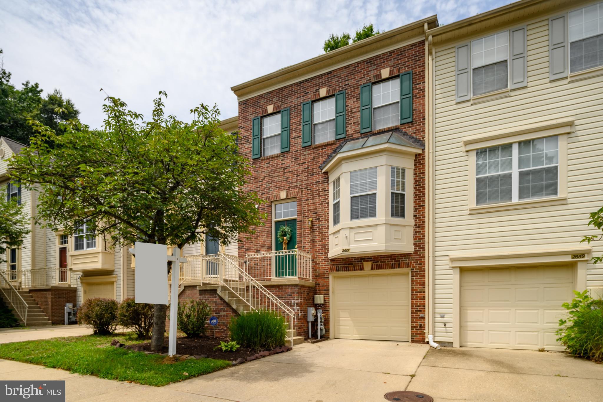 Move right into this well-maintained garage townhome in the desirable Crofton community of Walden! Fresh paint and new flooring throughout give the home a bright, updated feel. The kitchen has been refreshed with stainless steel appliances and opens to the main living area, where two French doors lead to a spacious composite deck overlooking private woods—an ideal setting for relaxing or entertaining. The upper level features a spacious owner's suite with an adjoining loft that's perfect for a home office, reading nook, or exercise space. The loft also provides access to floored attic storage and an attic fan for added convenience. The owner's bath includes a soaking tub, while two additional bedrooms and a full hall bath complete the upper level. The finished lower level offers a large family room, plenty of storage space, and access to the attached garage. Additional updates include a brand-new roof with new skylight, offering peace of mind for years to come. Ideally located in sought-after Crofton, you'll enjoy easy access to shopping, restaurants, golf, parks, commuter routes, and all the amenities that make this area such a desirable place to call home.