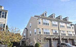 Large/Cozy Luxury 2.5 Level Garage townhouse condo Features 3 Large Bedrooms, 2 Full and 1 half Bath, Luxury Master bath with separate Tub and Shower, Master bedroom with tray ceiling and Walk-in closet, Spacious sun filled living and dining, Nice Kitchen with 42 Inch Cabinets, Raised Corian countertops. Main level hardwood flooring - spotless carpet in all bedrooms. Entrance and garage only on first floor. Walk to major shopping- Costco, supermarkets, restaurants, banks etc- min from I-66, VRE etc. No smoking, requires good credit, clean background and proof of income. Landlord prefers 2+ year lease. Apply on-line