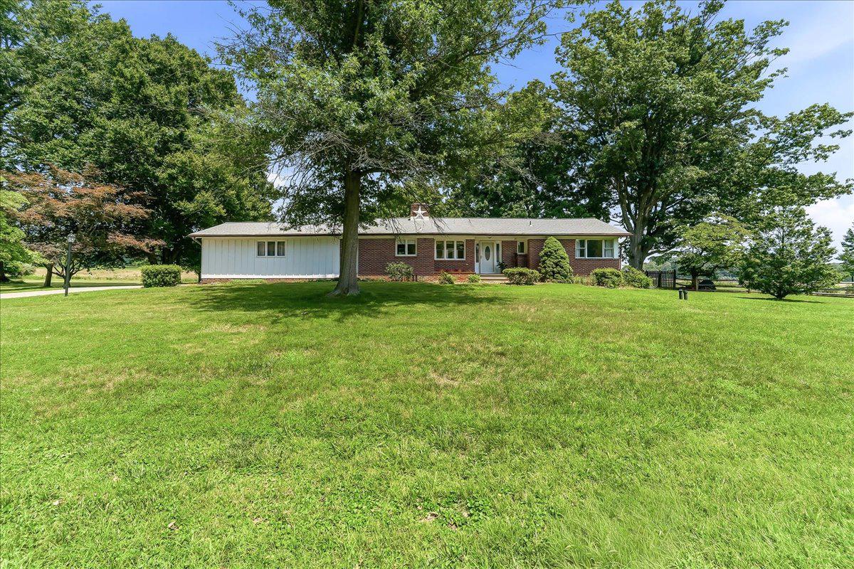 Rare opportunity in Lower Providence Township! Nestled in a quiet residential community bordering Valley Forge National Park, this solidly built 1961 ranch home blends timeless character, pride of ownership, and an unbeatable location. Featuring an efficient single-story floor plan, this 3-bedroom, 2.5-bathroom property is designed for comfortable living. The centerpiece of the home is an expansive rear living room offering scenic parkland views, a cozy wood-burning fireplace, and direct access to a relaxing enclosed sunroom. This main living area flows seamlessly into a spacious eat-in kitchen, making daily living and entertaining a breeze. The primary bedroom features its own private ensuite bathroom, while two additional bedrooms share a full hallway bath.
Need more space? The basement is functionally maximized to include a large family room perfect for movie nights, a dedicated office/bonus room, a convenient powder room, a laundry area, and abundant space for tools, mechanicals, and storage. Car enthusiasts and hobbyists will love the oversized 2-car garage, which offers ample space for a workshop and storage. Move right in with absolute peace of mind knowing major capital upgrades have already been completed: a new water treatment system (July 2026), a new roof (2021), a poured concrete driveway (2018), and the house is serviced by Public Sewer (2004), a 200-AMP electrical panel and has Central Air Conditioning. Located within the top-rated Methacton School District, this home offers a quick commute to King of Prussia, Phoenixville, and the Main Line and beyond. Bring your personal decorating ideas and make 33 Vaux Lane your forever home!  Buyer is responsible for all Lower Providence Use & Occupancy requirements as well as ordering the U&O.   Buyer to verify any square footage measurements as they are estimated,  and calculated via a software program