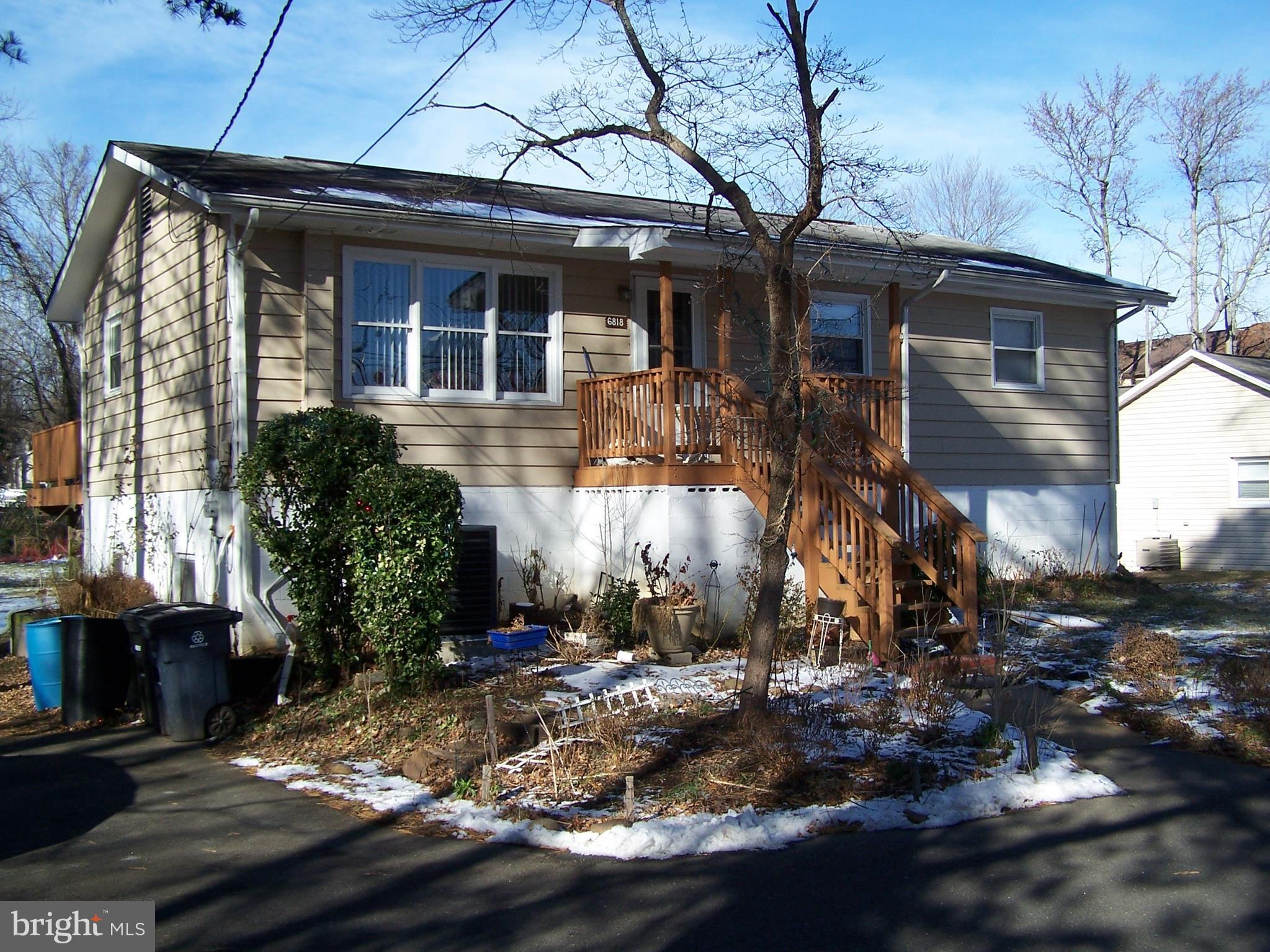 Spacious renovated, new kitchen with granite, hardwood floors, sliders to deck & over sized lot. Fully finished lower level with in law suite, private entrance, ceramic floor. Like new heat & AC. Lost of extra parking. Easy commute to 295, 495 & DC