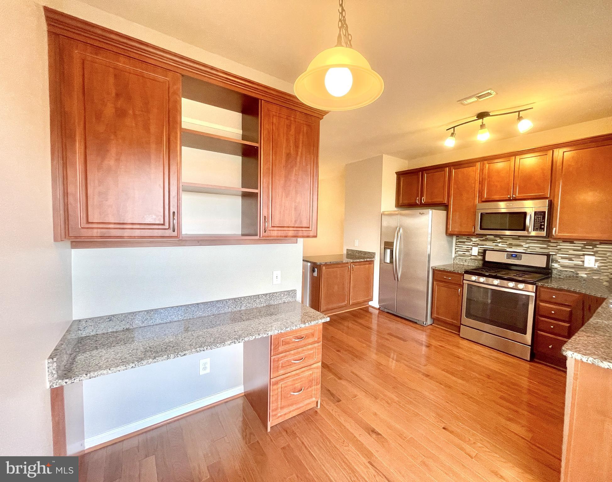 -- OPEN HOUSE- SUNDAY- 2PM - 4PM --
Step into this meticulously upgraded 3-bedroom, 3.1-bath, 3-level townhome with a one-car garage, nestled in the tranquility of Brambleton's highly sought-after neighborhood. This home boasts an open floor plan flooded with natural light. The kitchen is equipped with top-notch features, including hardwood floors, granite countertops, Stainless Steel appliances, and a custom-built office desk for added convenience. 

The owner's suite provides a serene tree-line view, two closets, and a thoughtfully designed custom-built linen closet. The owner's bathroom is a retreat with a spacious soaking tub, a separate shower, a double-sink vanity with a granite top, and ample space. Newly installed carpet, new hardwood floors throughout the main level, and freshly painted walls. The rear deck offers a delightful entertaining spot overlooking a fenced-in backyard. 

The homeowners' association (HOA) covers essential services such as lawn care, rear yard maintenance, high-speed internet, cable TV, and more. Brambleton itself is a vibrant community featuring amenities like restaurants, shops, a fitness center, a movie theater, a library, farmers markets, walking/bike trails, tennis courts, parks, a dog park, pools, and a clubhouse. 

Convenience is key, with proximity to the Ashburn Metro Station, Toll Rd, and Dulles International Airport, making this home an ideal blend of luxury and practicality. Welcome to your new home!
