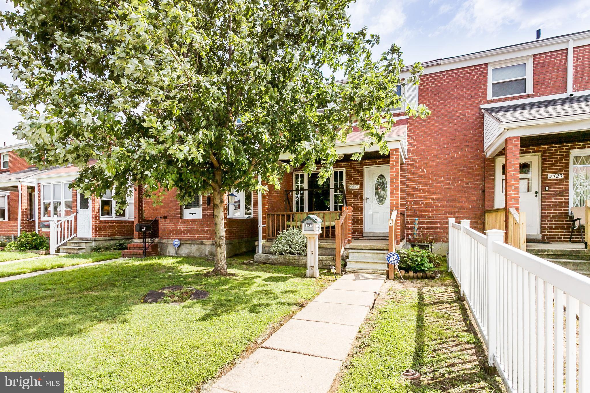 Move in ready home with 2 car parking on a quiet block, yet close to everything. The front porch welcomes you in to the bright and inviting living room, with crown molding and attractive floors. 2nd fl features 3 beds each with ceiling fans  and a pristine bathroom. The large finished basement is a perfect multi-use room that could be a 4th bedroom. Privacy fenced rear yard. Central air condition.