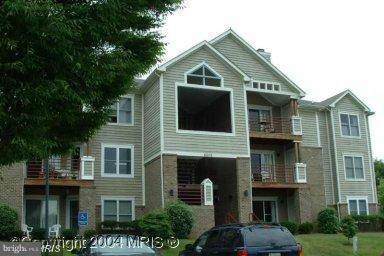 Entry level Unit with a private Parking Space! 2 bed, 2 bath, Kitchen, Separate Dining, Family Room with Fireplace. Patio and storage shed. All new paint thru-out and all new flooring. Community offers Pool, Clubhouse, Work-out Room. Easy Commute to Baltimore, DC or the Eastern Shore!