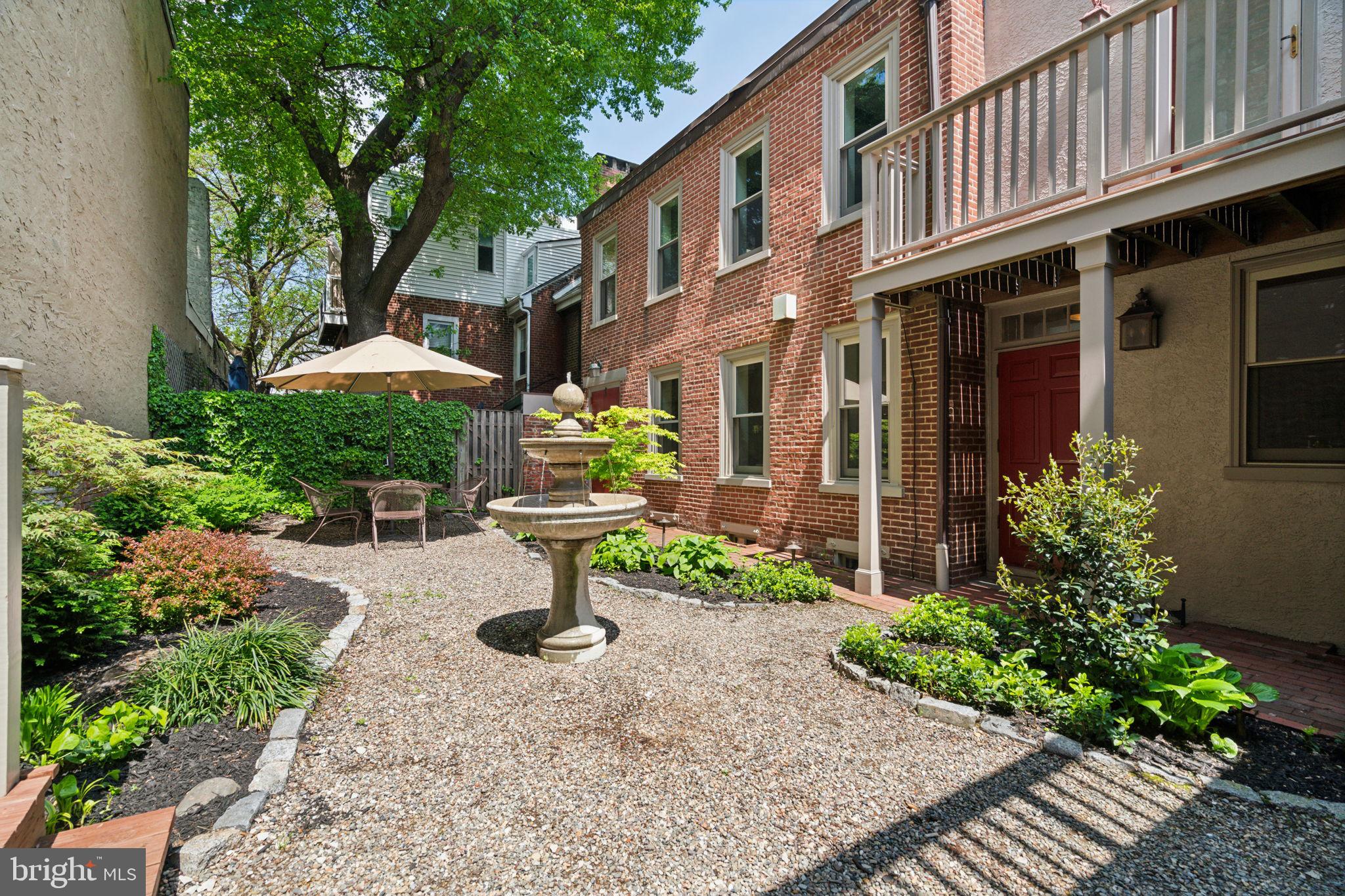Old City at its best and most unique with this pristine Colonial style 2700 sq ft +- home that wraps around its park like private garden on a double wide lot (36' wide) with garage. Incredible newer cooks kitchen featuring a Wolf gas cooktop with pot filler, Miele dishwasher and Kitchen Aid double wall ovens as well as beautiful stone tops and tile splashes. Just off the kitchen is the wet bar with a top end ice maker that provides an endless supply of fresh ice. Half bath on this level as well. All ground floor living space including living room dining room and kitchen has windows facing the oversized private garden/outdoor area. Endless opportunities here for seamless inside and outside entertaining / barbecue or just lounging with friends and family. In addition to the garden there is a large roof deck above the garage. The second floor features the rear main bedroom with its in suite full bath, oversize den area as well as front bedroom and pristine new hall bath with heated floor, tub and pedestal sink. The third floor features another pristine new bath with frameless door for the barrier free stall shower as well as heated floor and pedestal sink along with the third bedroom. Up to the finished attic level with a room that could either be a guest bedroom or study. Old City is often referred to as the most historic square mile in the USA. Its cobblestone streets and many buildings still feature original brick, cast iron and stone architecture from the 18th century. With a walk score of 94, transit score of 100 and bikers score of 90, you are close to and within walking distance to historic landmarks like Independence Mall, Penn's Landing, and Franklin Square Park. Some of the city's best restaurants are also close by. Amazing coffee shops, unique shopping, wonderful galleries and design boutiques. Nearby Columbus Blvd is home to Cherry Street Pier, Spruce Street Harbor Park and the new Penns Landing park. Easy access to Center City, Northern Liberties, Fishtown and South Jersey. Access to I-95 and I-676 are just 5 min away and the 30th Street Amtrak station is a 15 min drive.